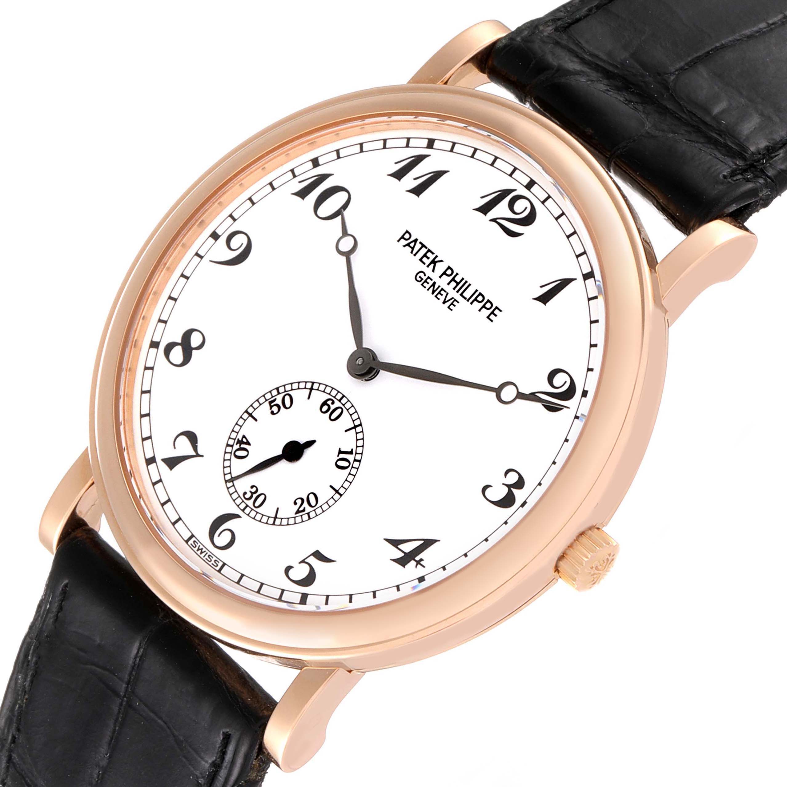 The image shows a side-angle view of a Patek Philippe Calatrava 5022R Men's Rose Gold White Dial 5022R Men's Rose Gold White Dial watch, highlighting its white dial, black numerals, and black leather strap.