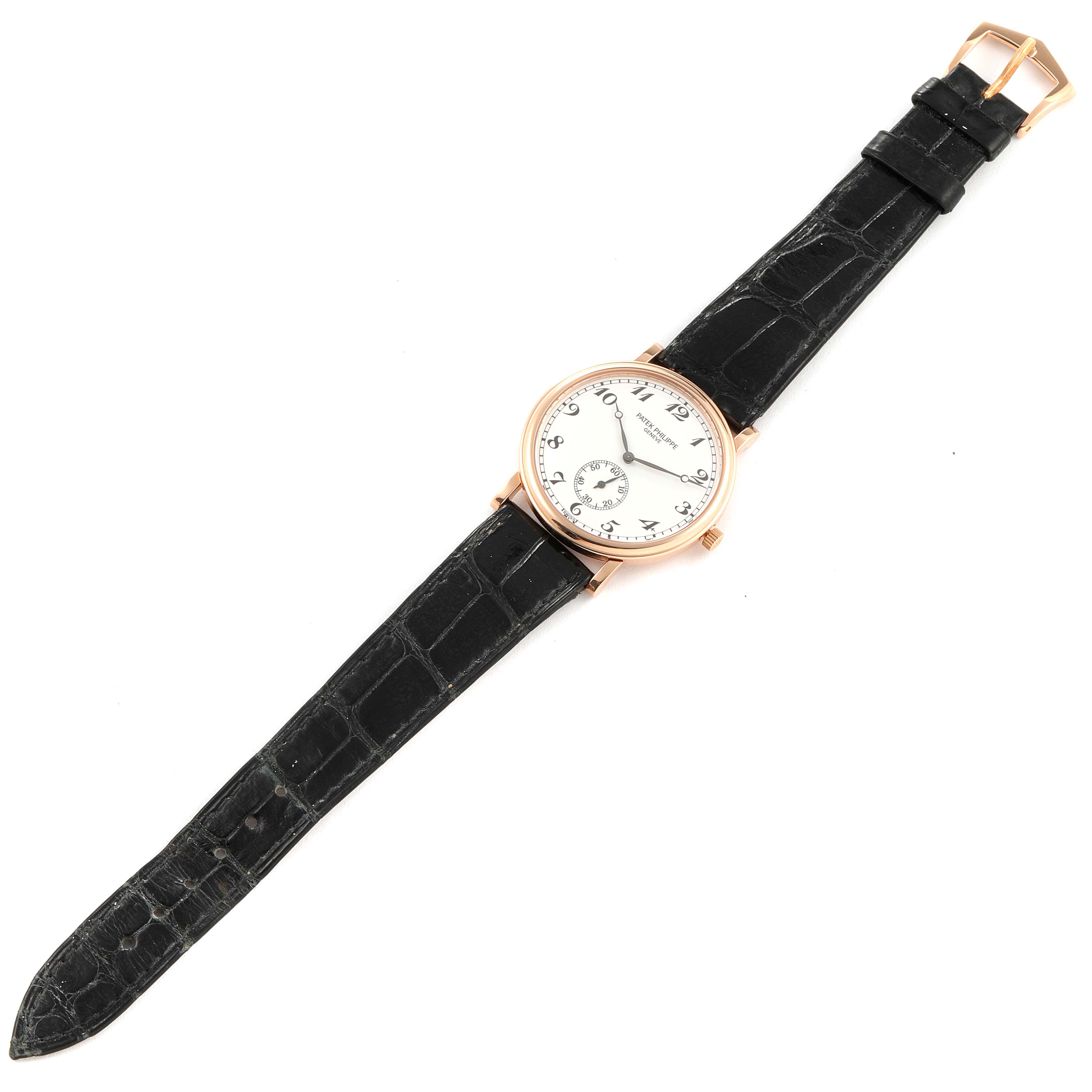 The image shows a Patek Philippe Calatrava 5022R Men's Rose Gold White Dial 5022R Men's Rose Gold White Dial watch from a top-down angle, displaying the dial, case, and leather strap.