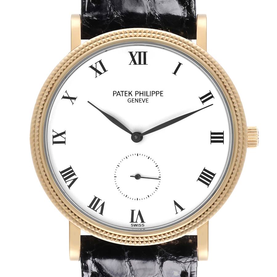 The Patek Philippe Calatrava watch is shown from a front angle, highlighting the dial, hands, and leather strap.