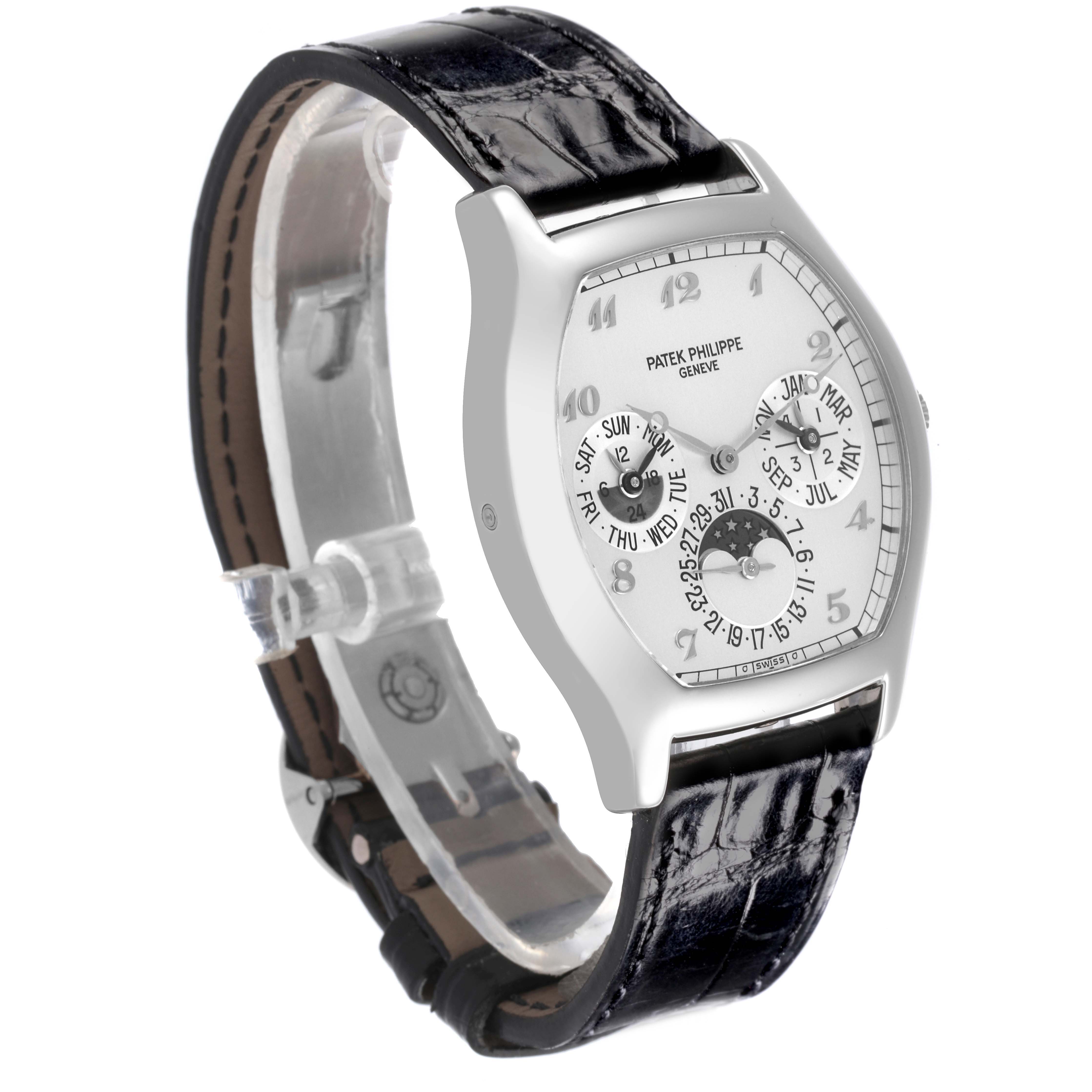 The Patek Philippe Complications 5040G Men's White Gold Silver Dial 5040G Men's White Gold Silver Dial watch is shown at a three-quarter angle, highlighting the face, hands, and black leather strap.