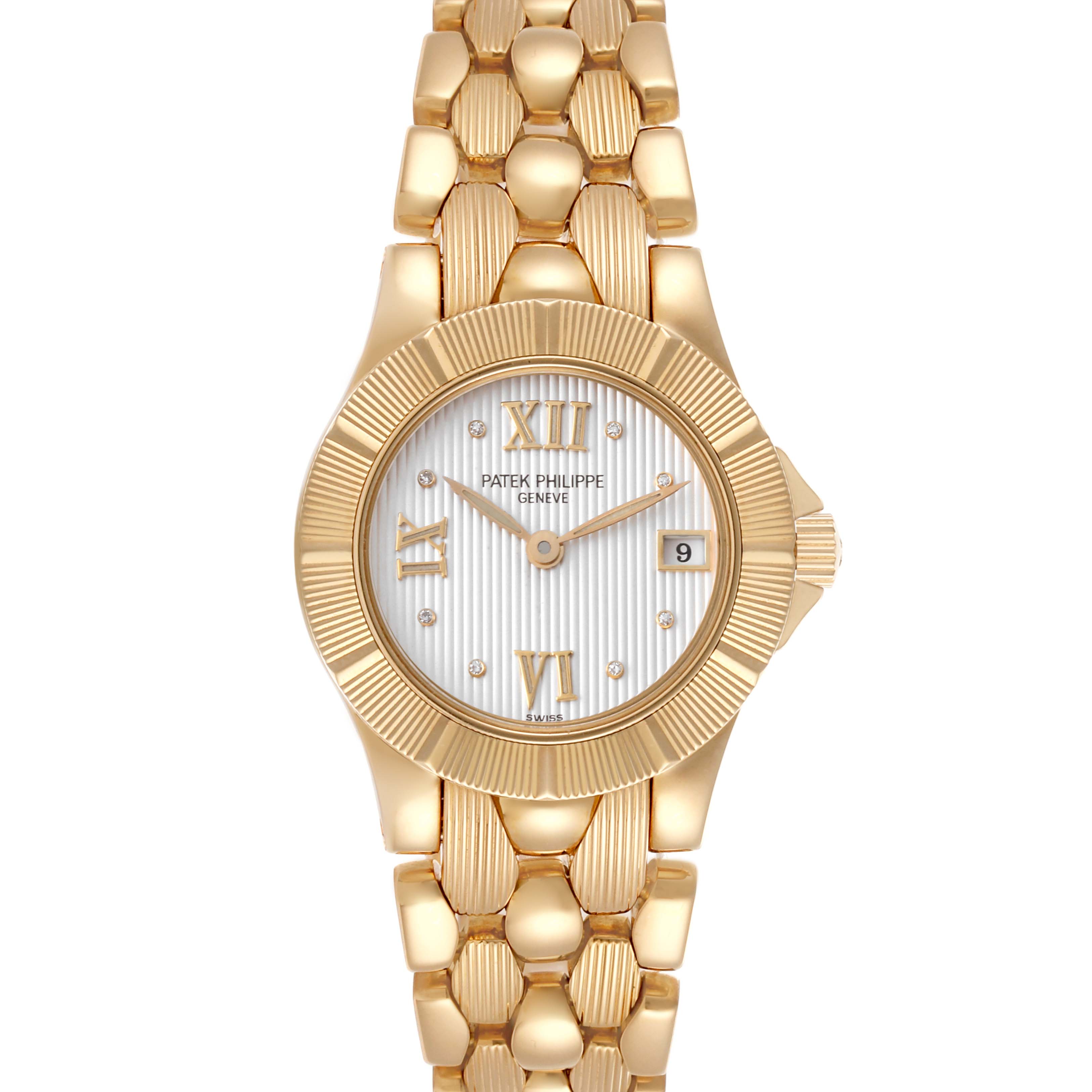 The Patek Philippe Neptune 4881/1J-001 Women's Yellow Gold Silver Dial 4881/1J-001 Women's Yellow Gold Silver Dial watch is shown from a top-down angle, revealing its face, bezel, and bracelet.