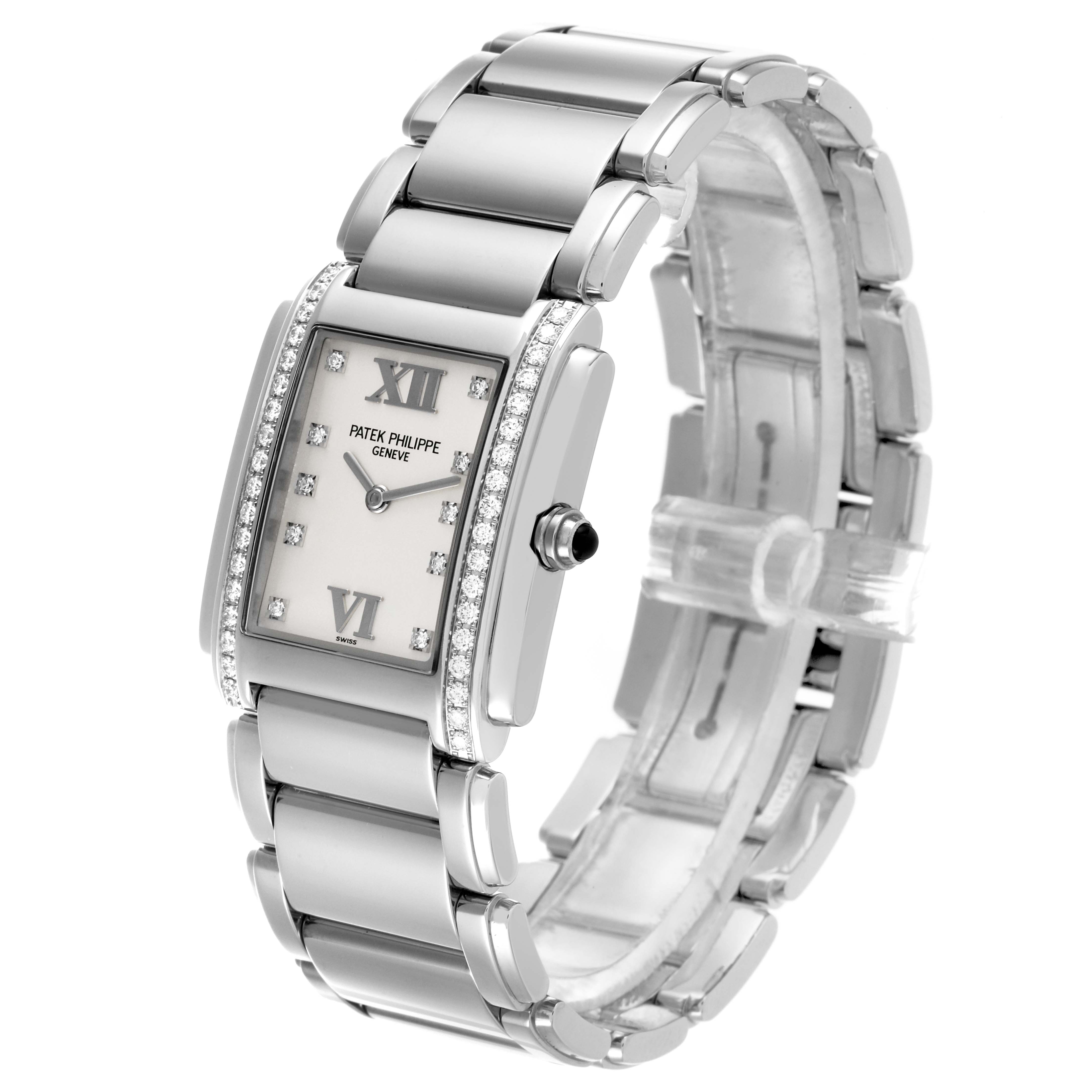 The Patek Philippe Twenty-4 4910/10A-011 Women's Stainless Steel Silver Dial 4910/10A-011 Women's Stainless Steel Silver Dial watch is shown at an angle displaying the bracelet, case, and diamond-set bezel.