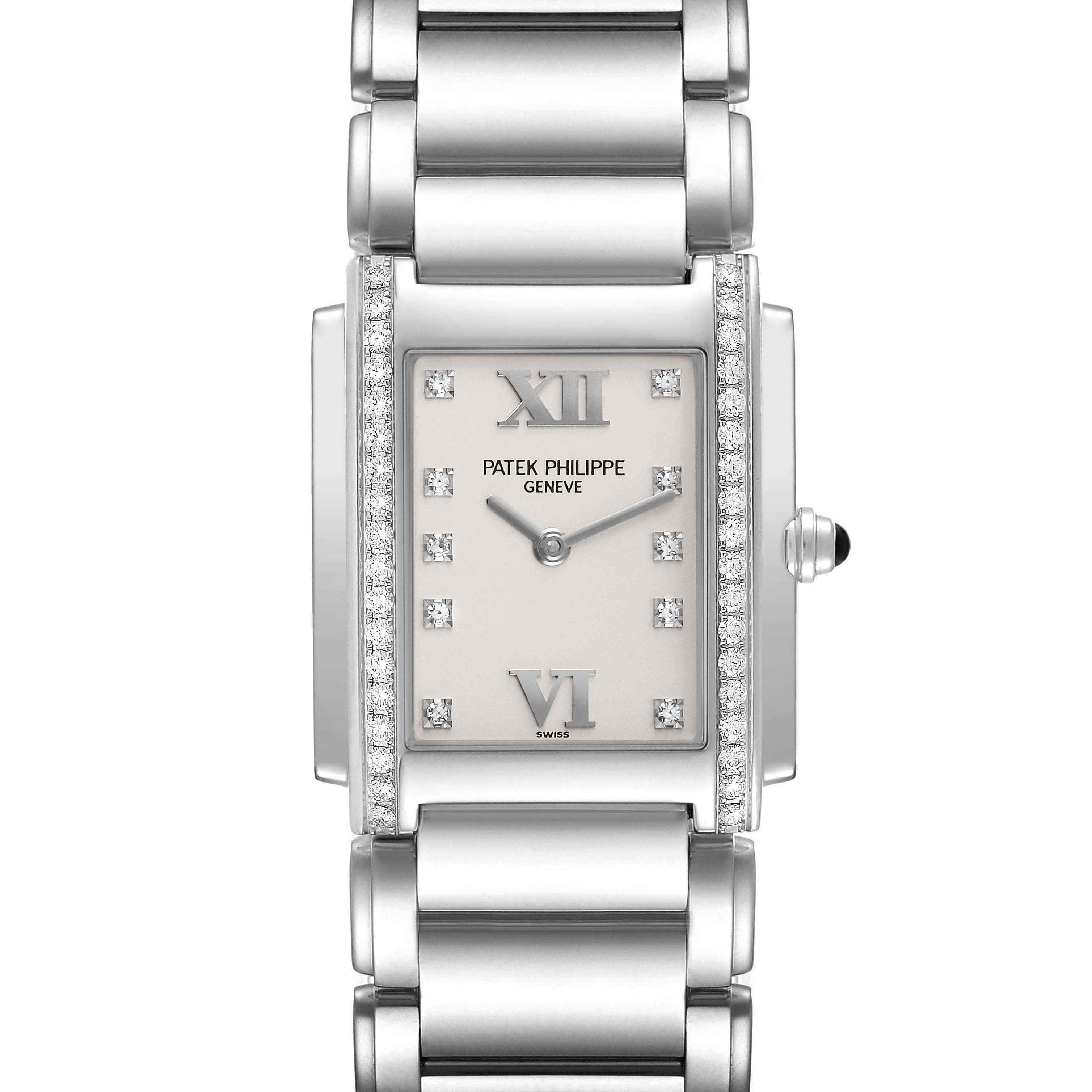 The Patek Philippe Twenty-4 4910/10A-011 Women's Stainless Steel Silver Dial 4910/10A-011 Women's Stainless Steel Silver Dial watch is shown from a top, centered view, highlighting the face, bezel, and partial bracelet.