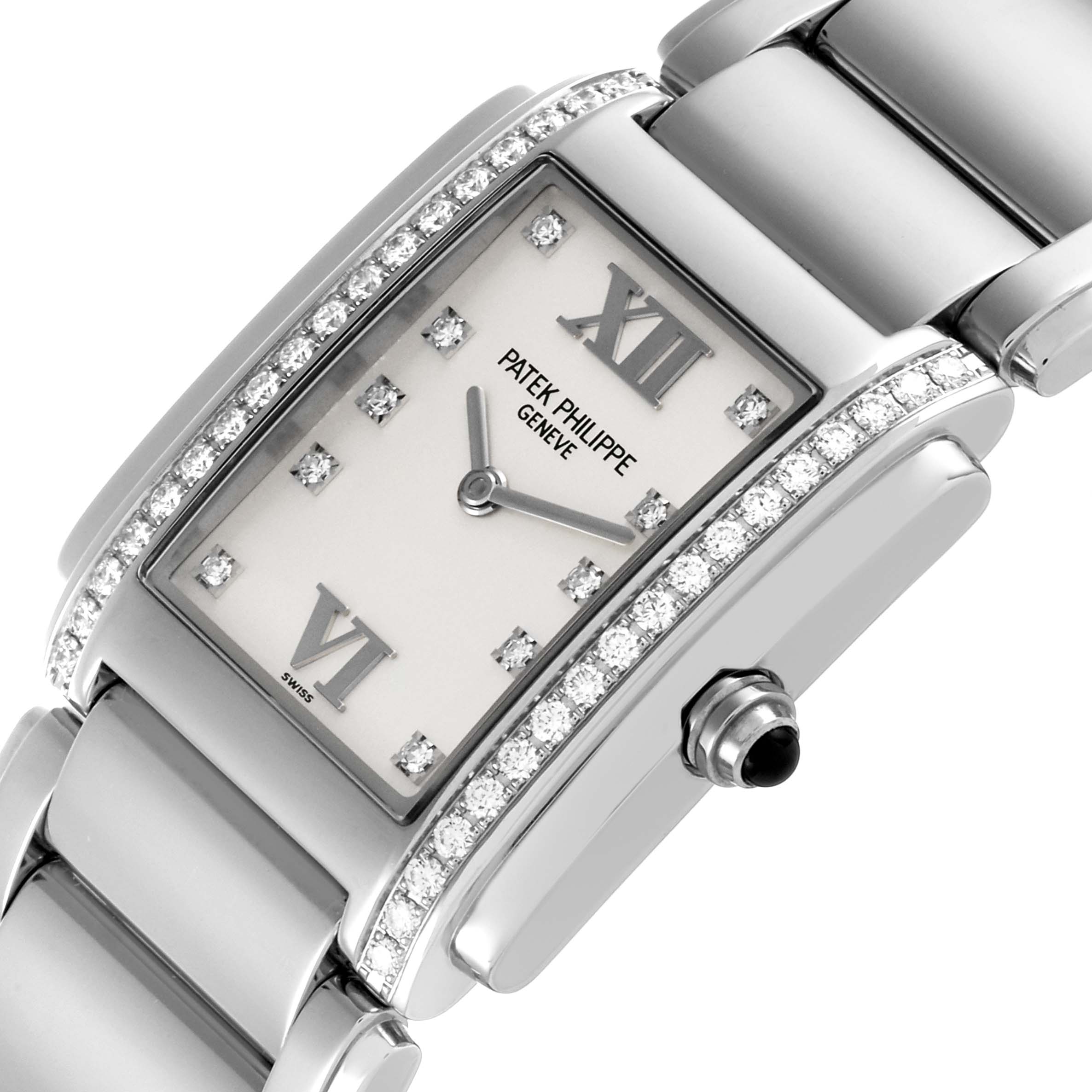The Patek Philippe Twenty-4 4910/10A-011 Women's Stainless Steel Silver Dial 4910/10A-011 Women's Stainless Steel Silver Dial watch is shown at an angled view, highlighting its diamond-set bezel and metal bracelet.