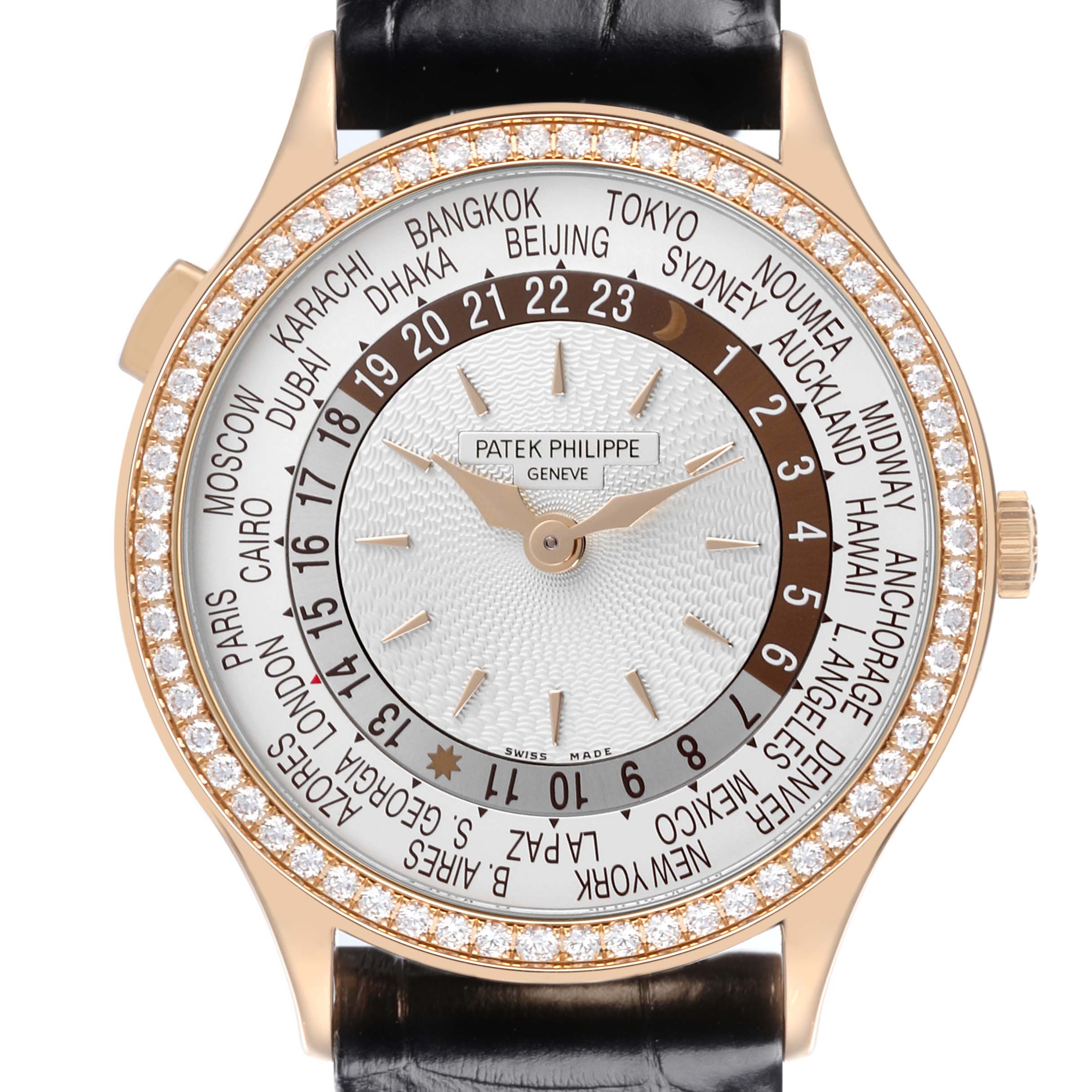 The Patek Philippe Complications 7130R-013 Men's Rose Gold Silver Dial 7130R-013 Men's Rose Gold Silver Dial watch is shown from the front, highlighting its face, bezel, hands, and time zone ring.