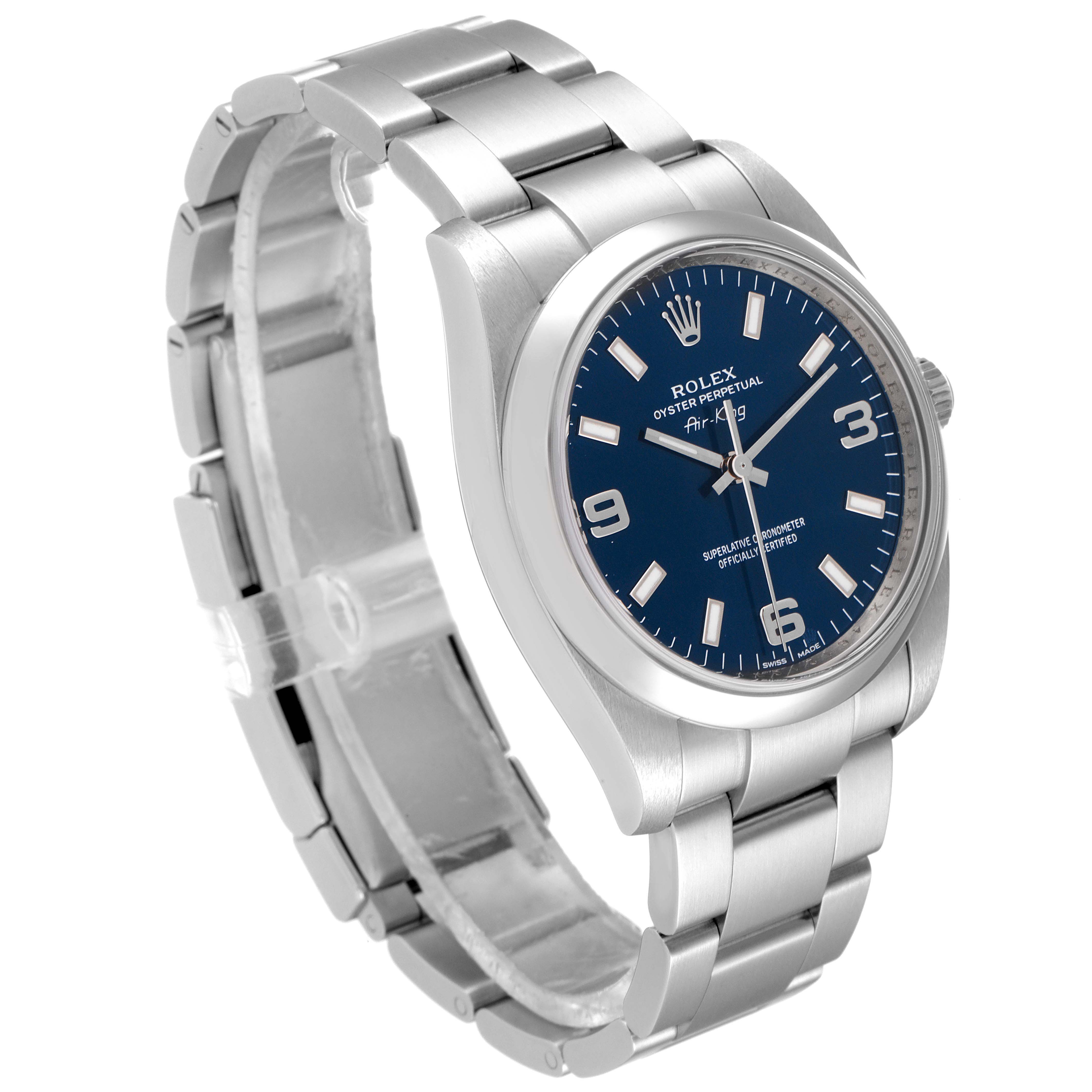 The Rolex Air-King 114200 Men's Stainless Steel Blue Dial 114200 Men's Stainless Steel Blue Dial watch is shown at an angle highlighting its face, bracelet, and clasp.