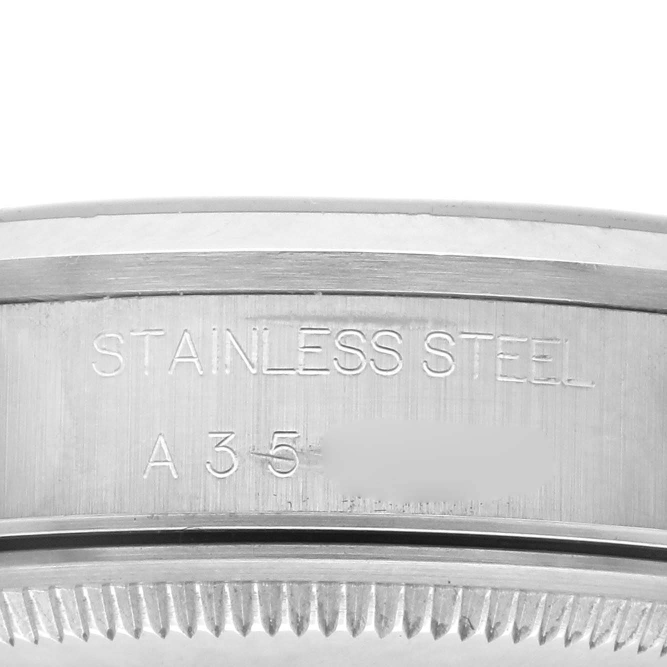 The image shows the side of a Rolex Air-King 14000 Men's Stainless Steel Blue Dial 14000 Men's Stainless Steel Blue Dial watch, highlighting its stainless steel bezel and engraved details.