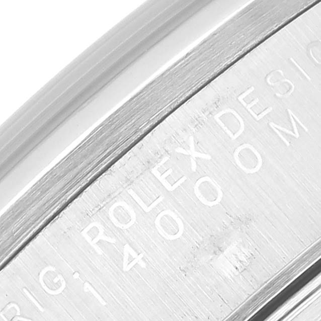 The image shows a close-up of the side engraving on an Air-King watch by Rolex, highlighting the model details.