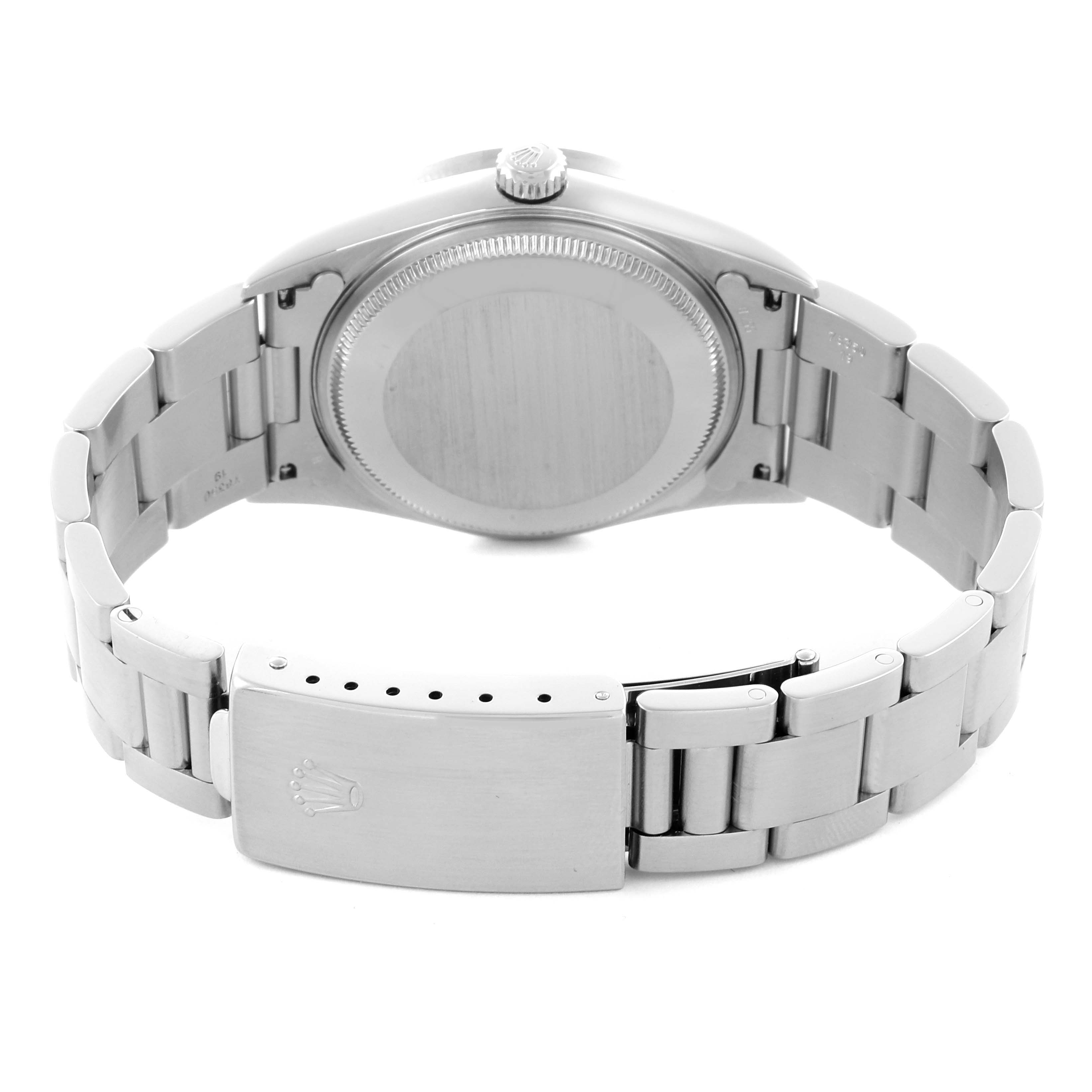 The image shows the back and bracelet of a Rolex Air-King 14010M Men's Stainless Steel Black Dial 14010M Men's Stainless Steel Black Dial watch from a rear angle.