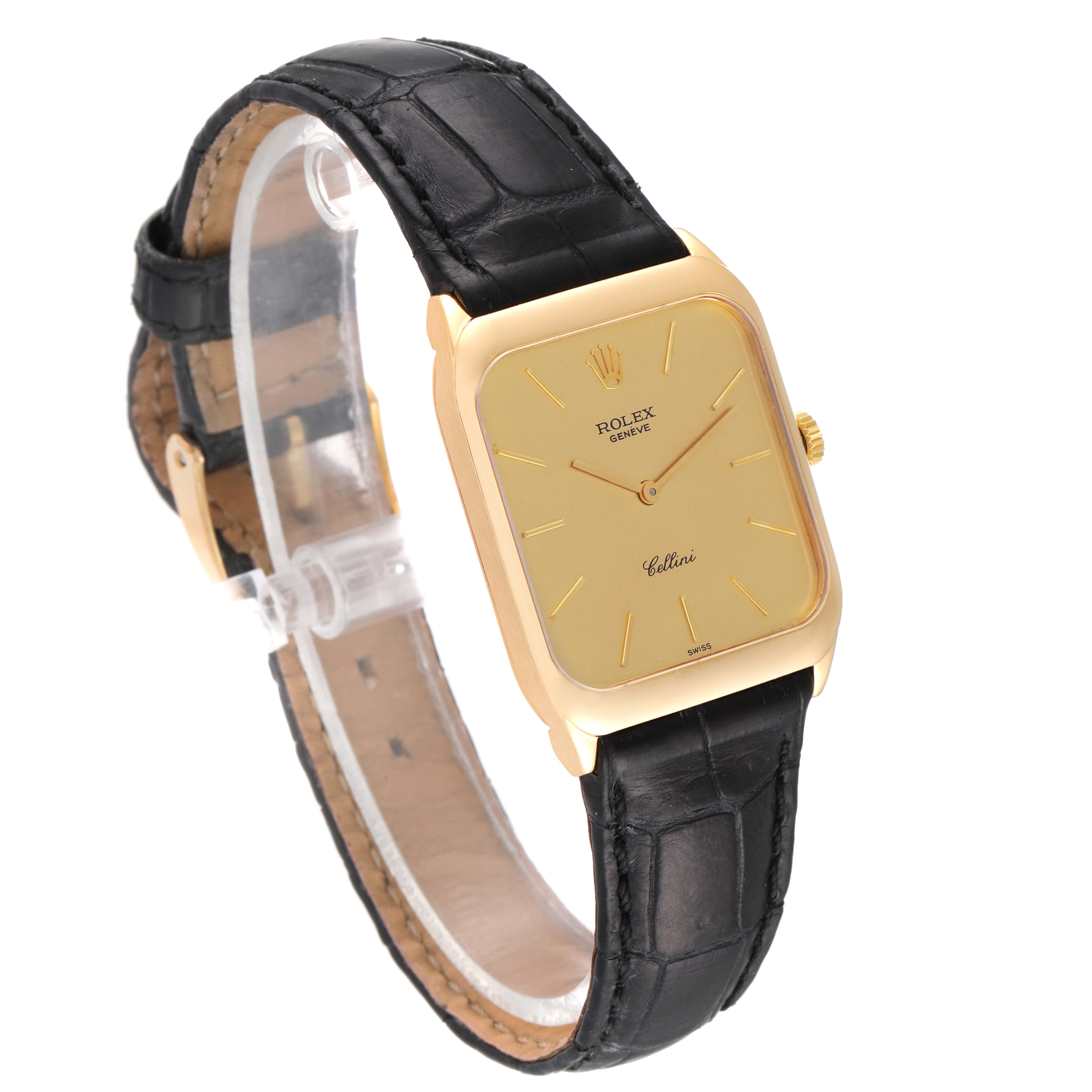 The image shows a side angle of a Rolex Cellini 4135 Men's Yellow Gold Champagne Dial 4135 Men's Yellow Gold Champagne Dial watch featuring a gold rectangular case and a black leather strap.