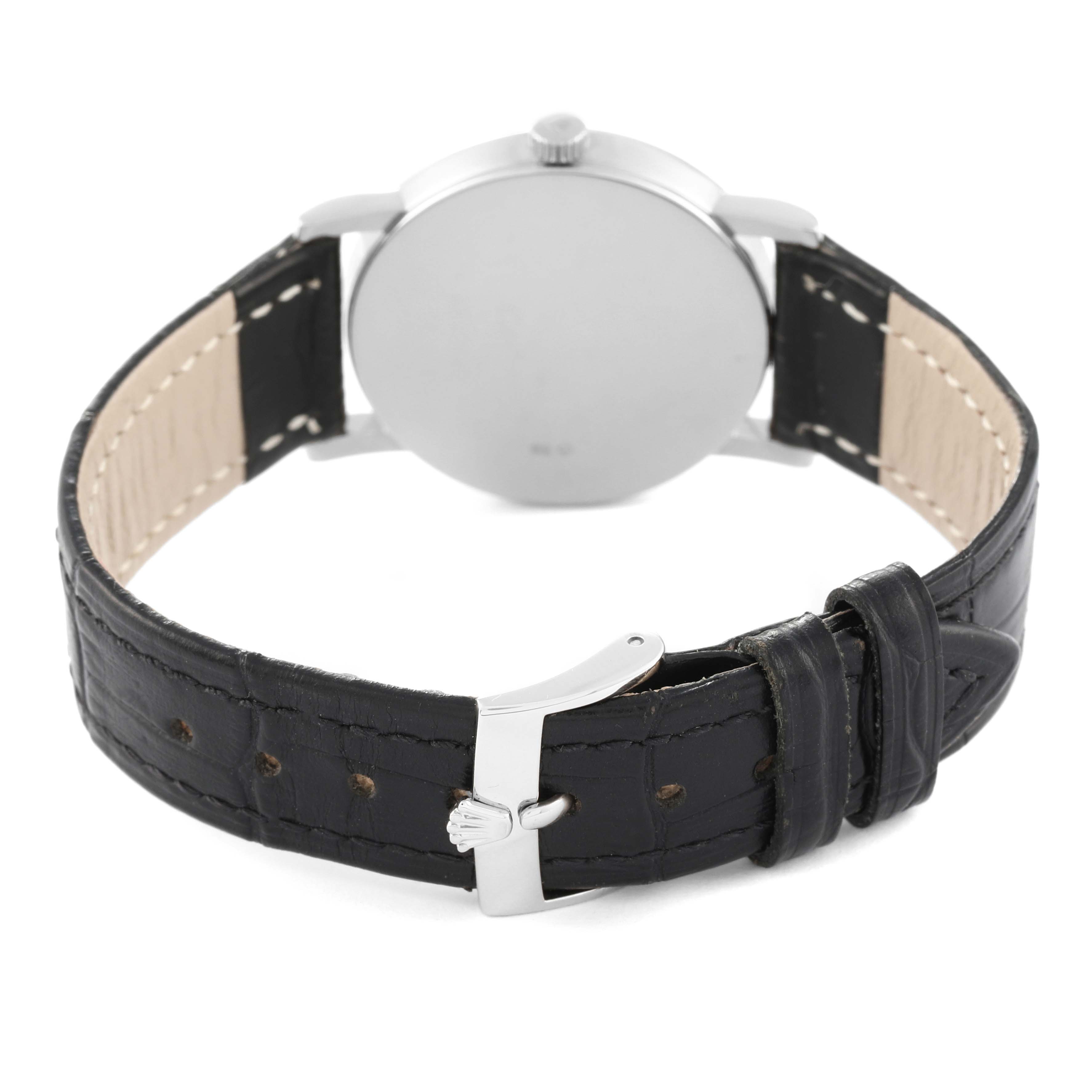 The image shows the back view of a Rolex Cellini 5115 Men's White Gold Black Dial 5115 Men's White Gold Black Dial watch, highlighting the black leather strap and silver buckle.