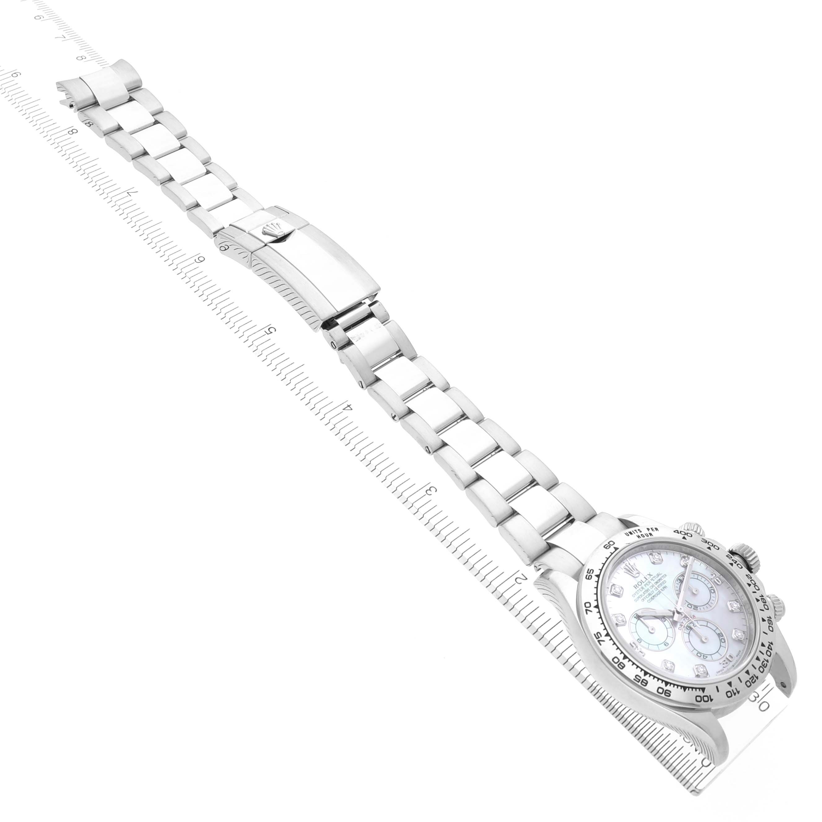 The Rolex Daytona 116509 Men
s White Gold Mother of Pearl Dial 116509 Men
s White Gold Mother of Pearl Dial watch is shown from a top-down angle, highlighting the entire bracelet and face.