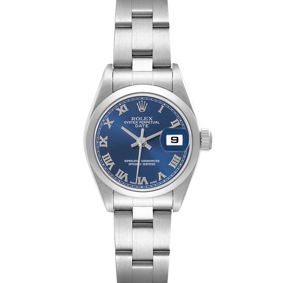 The Rolex Date watch is shown from a front angle, highlighting the blue dial, Roman numerals, date, and stainless steel bracelet.