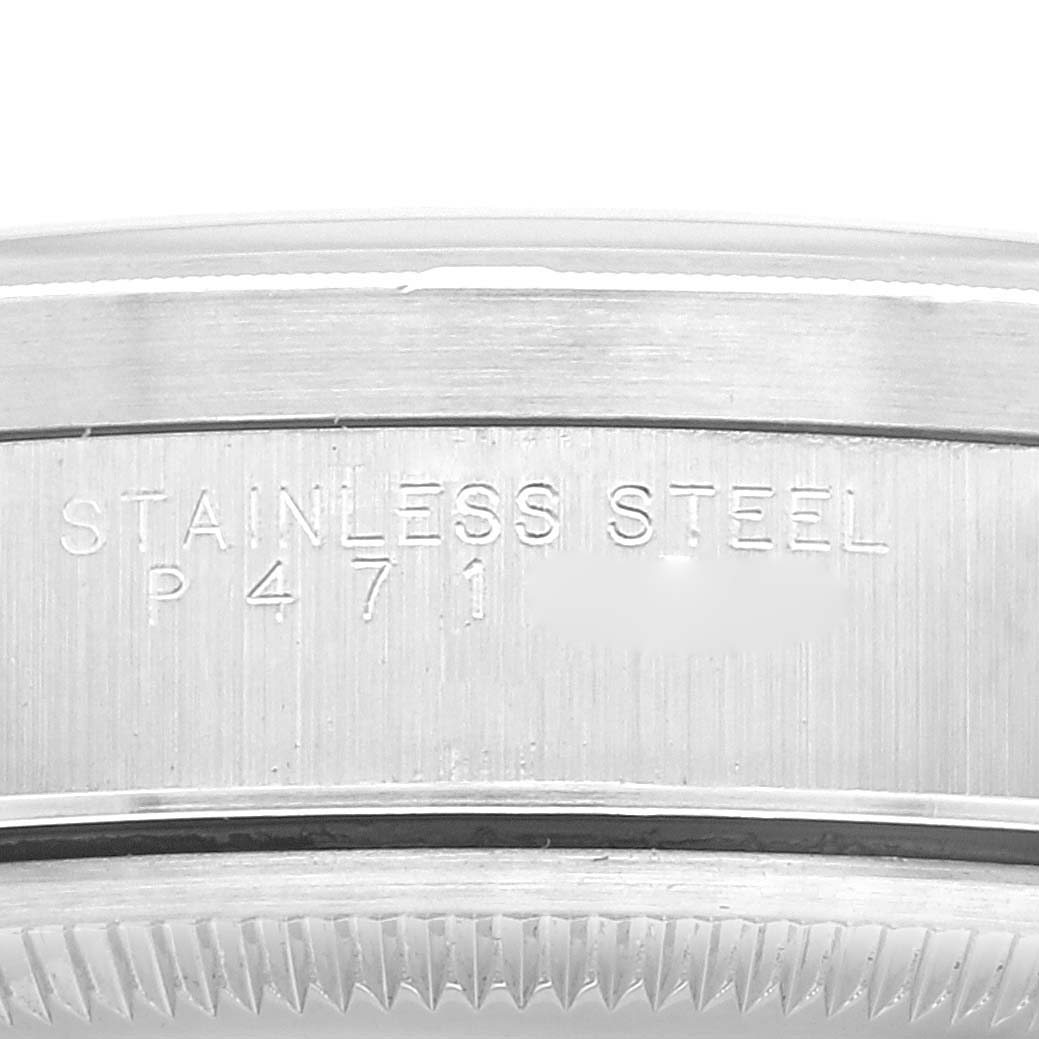 This image shows the side engraving of the stainless steel case of a Rolex Date 15210 Men
s Stainless Steel Black Dial 15210 Men
s Stainless Steel Black Dial model watch.