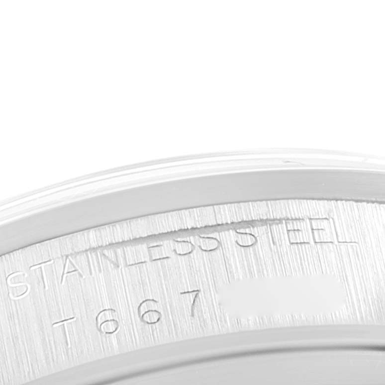 This image shows a close-up of the stainless steel case back of a Rolex Date 15200 Men's Stainless Steel White Dial 15200 Men's Stainless Steel White Dial model watch.