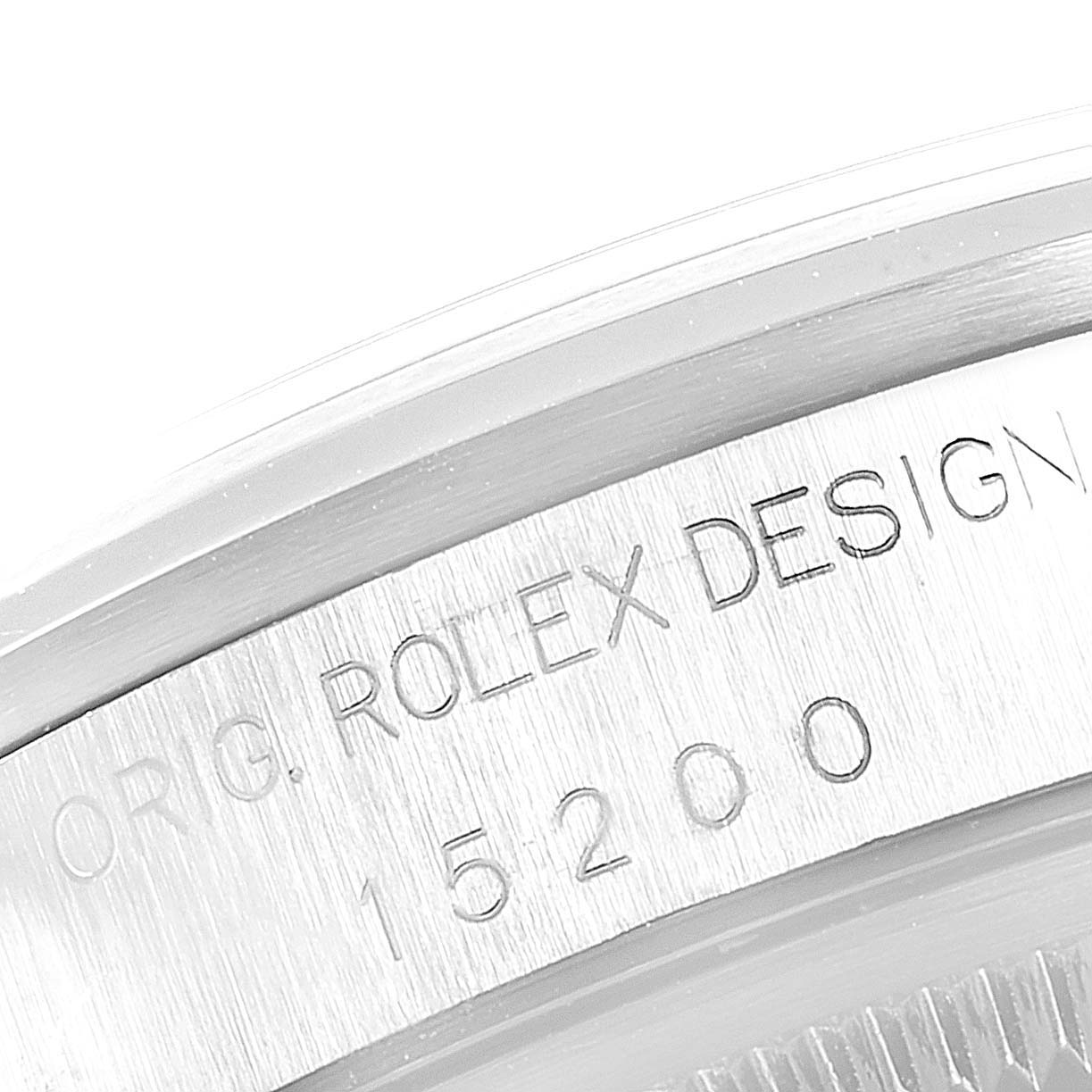 The image shows a close-up of the engraved case side of a Rolex Date 15200 Men's Stainless Steel White Dial 15200 Men's Stainless Steel White Dial model, highlighting the "ORIG. ROLEX DESIGN" text and the model number "15200".
