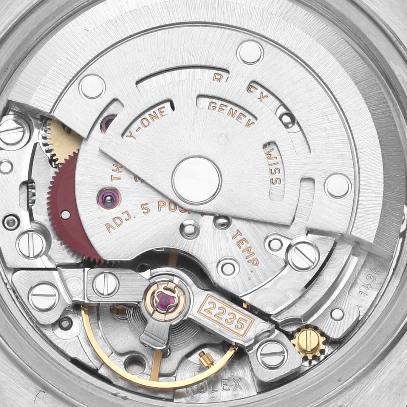 The image shows an intricate view of the Rolex Date 79160 Women's Stainless Steel Silver Dial 79160 Women's Stainless Steel Silver Dial's movement mechanism with gears and rotors visible.