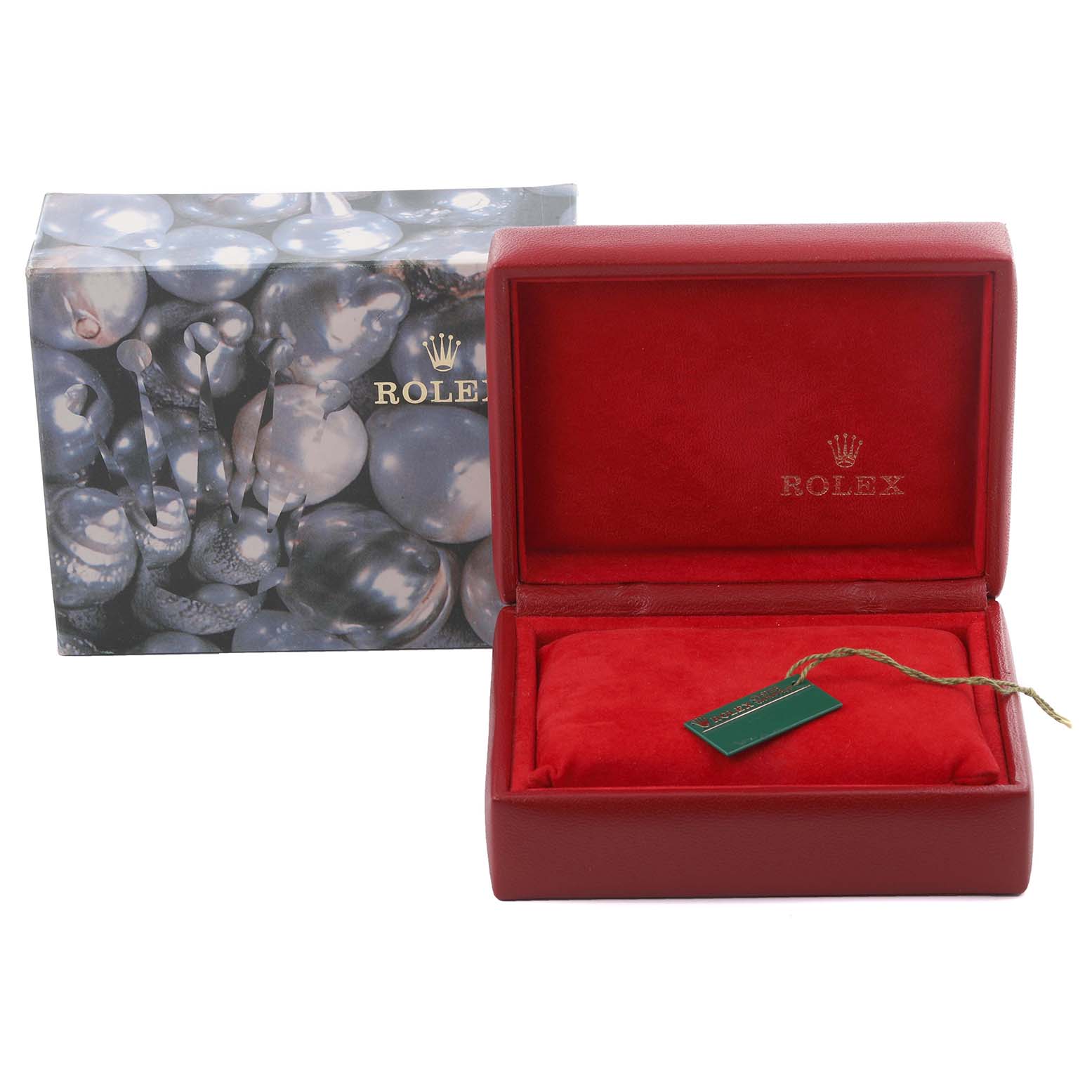 The image shows a Rolex Date 79160 Women's Stainless Steel Silver Dial 79160 Women's Stainless Steel Silver Dial model box, displayed open with a red interior and a tag, next to its exterior packaging.