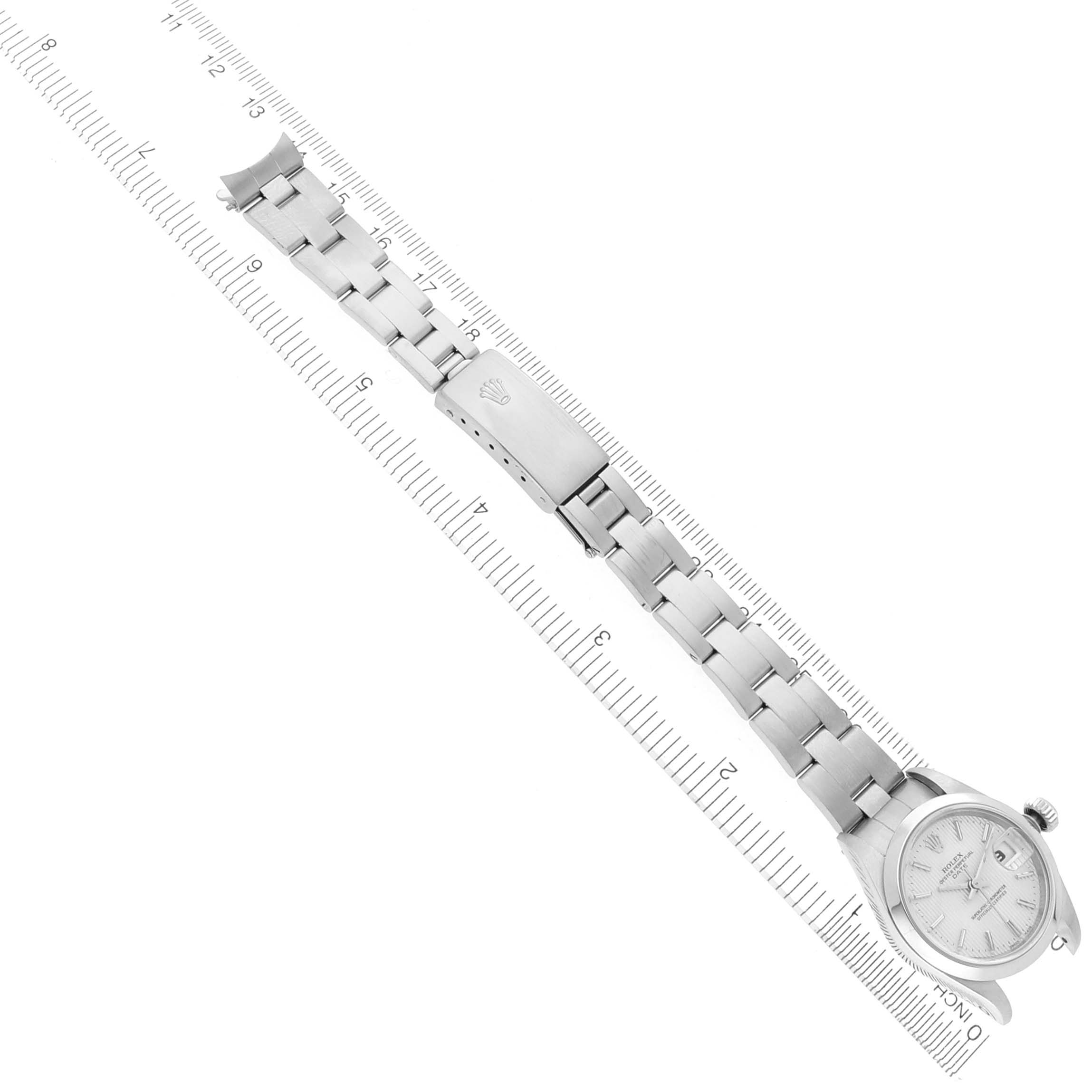 The Rolex Date 79160 Women's Stainless Steel Silver Dial 79160 Women's Stainless Steel Silver Dial watch is shown from an overhead angle, displaying the face, bracelet, and clasp.