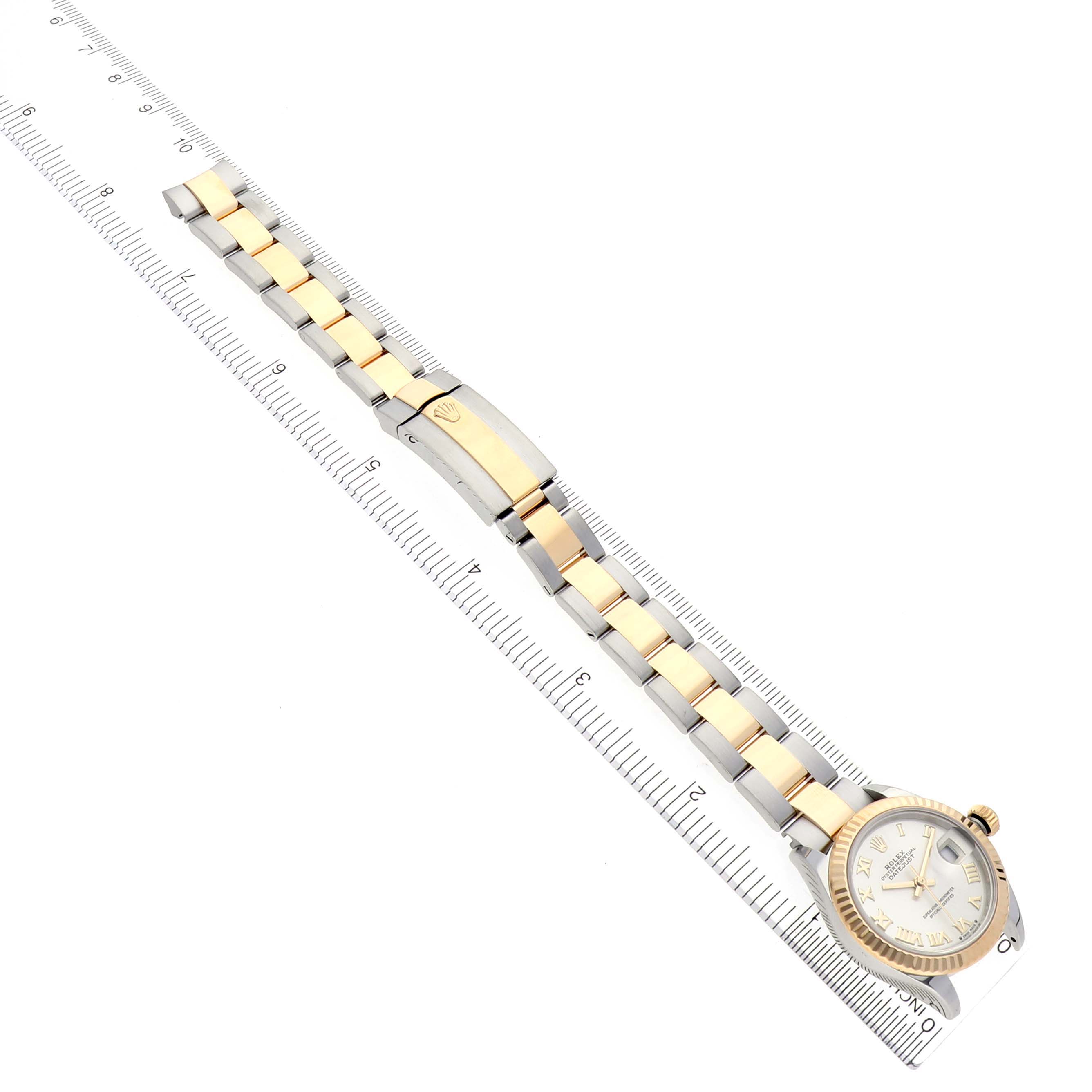 The Rolex Datejust 279173 Women's Steel and Gold (two tone) Silver Dial 279173 Women's Steel and Gold (two tone) Silver Dial watch is shown from an angled top view, featuring its face and metal bracelet.