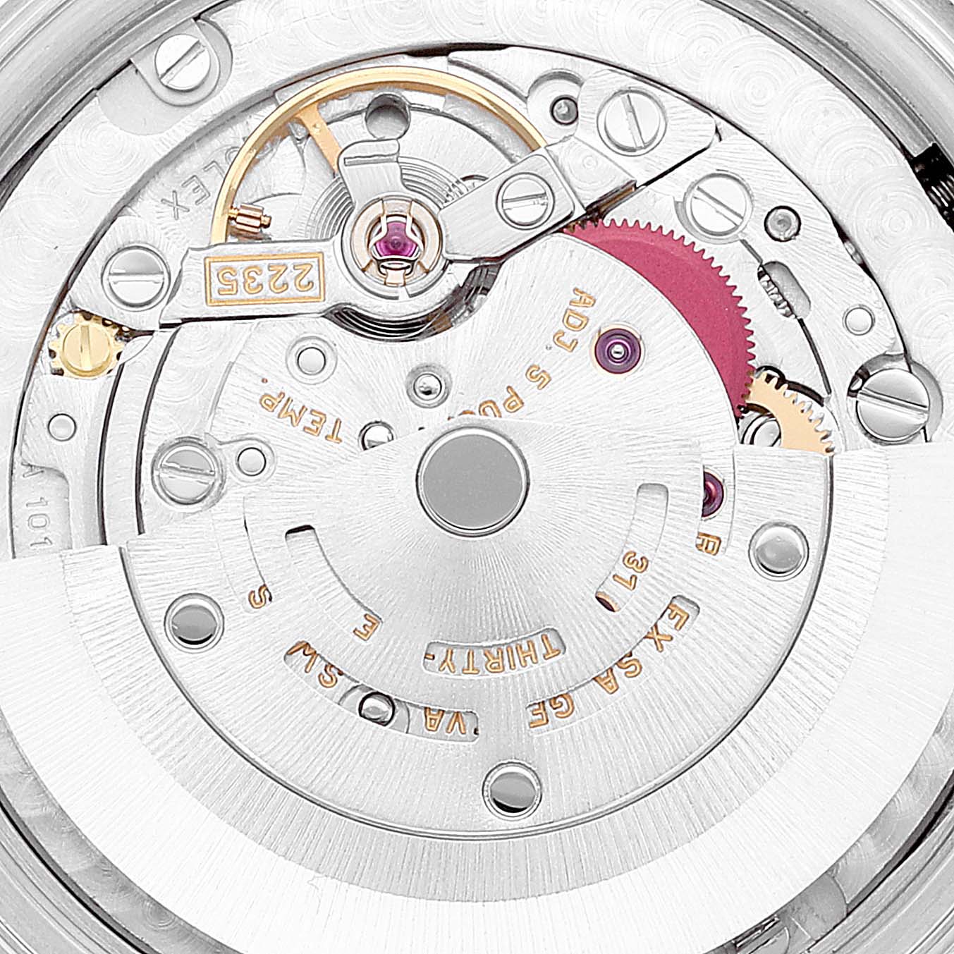 This image shows a close-up of the movement mechanism of a mid-size Rolex watch.