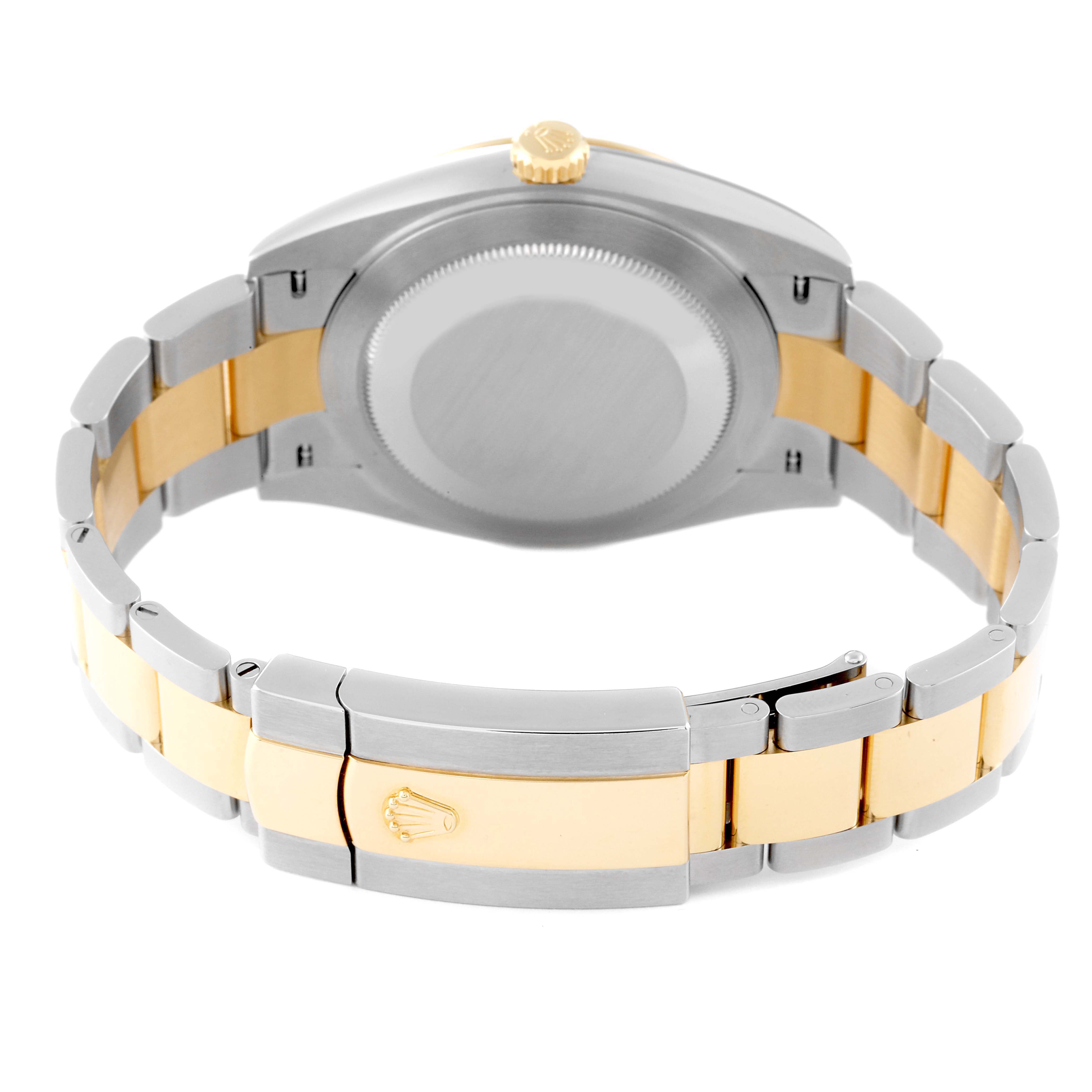The image shows the backside of the Rolex Datejust 41 126303 Men's Steel and Gold (two tone) White Dial 126303 Men's Steel and Gold (two tone) White Dial model, highlighting the case back, crown, and bracelet clasp.