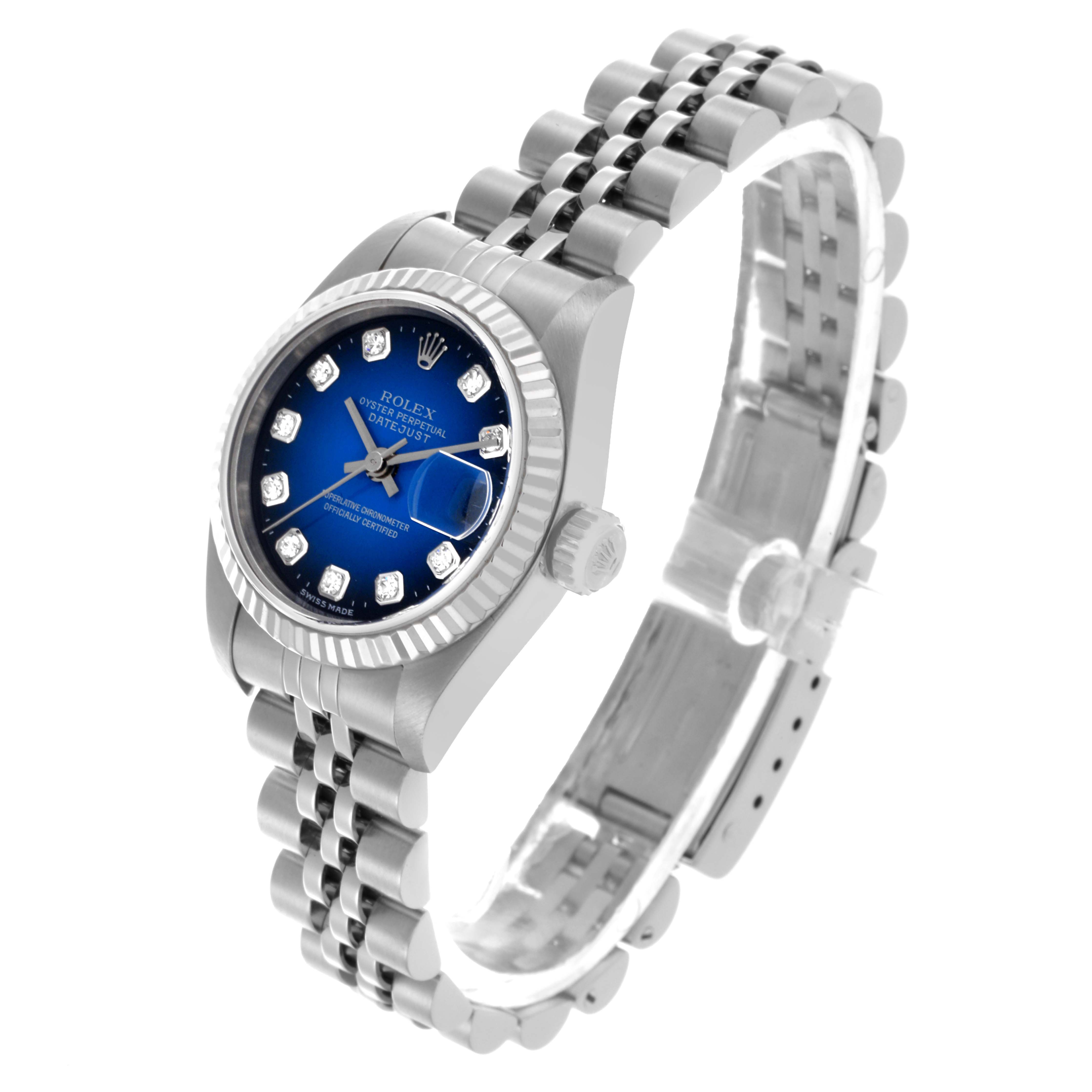 The Rolex Datejust 79174 Women's Steel and Gold (two tone) Blue Dial 79174 Women's Steel and Gold (two tone) Blue Dial watch is shown in a three-quarter angle, highlighting the dial, case, crown, and bracelet.