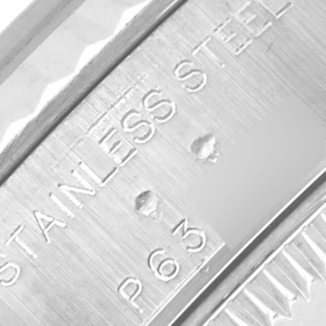 The image shows a close-up of the inner bezel and engravings of a Rolex Datejust 79174 Women's Steel and Gold (two tone) Blue Dial 79174 Women's Steel and Gold (two tone) Blue Dial watch.