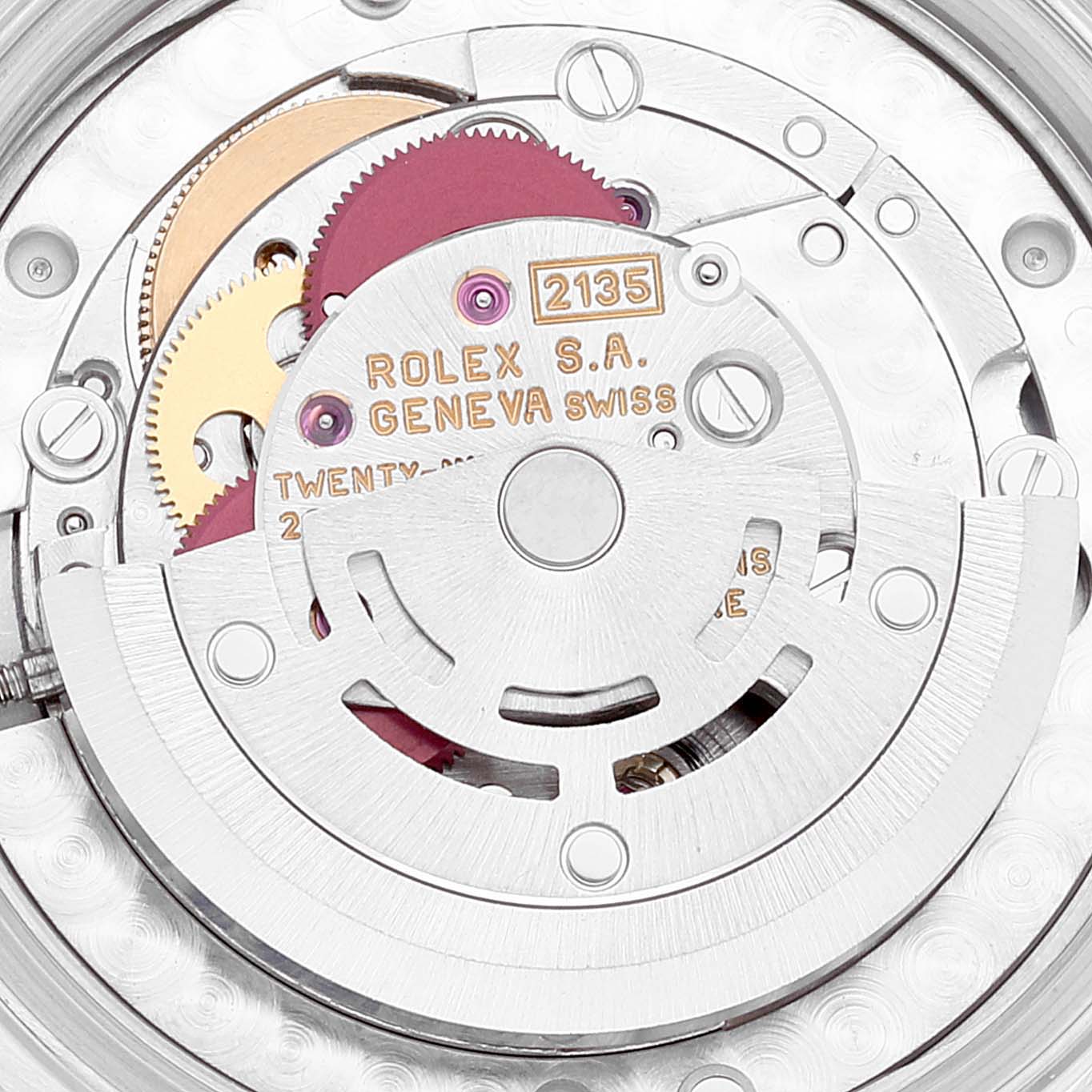 This close-up image shows the internal mechanism of a Rolex Datejust 68273 Women's Steel and Gold (two tone) White Dial 68273 Women's Steel and Gold (two tone) White Dial watch, highlighting its gears and rotor.