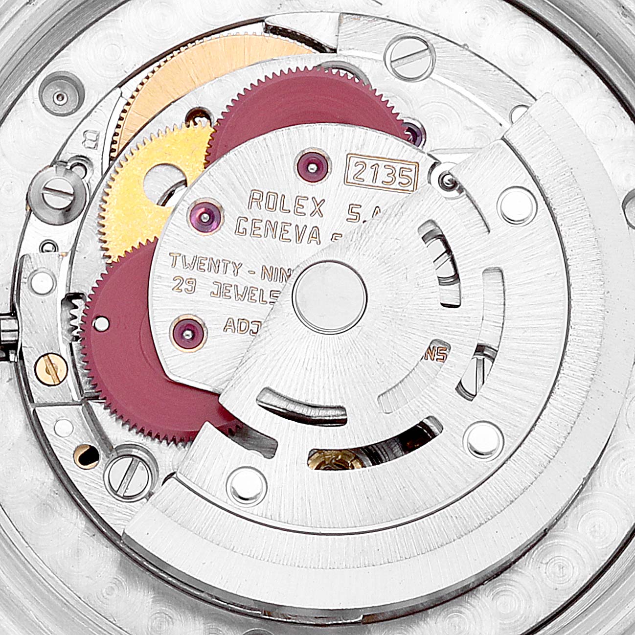 This is a close-up view of the internal mechanism parts of a Rolex Mid-Size 68273 Women
s Steel and Gold (two tone) Black Dial 68273 Women
s Steel and Gold (two tone) Black Dial watch.