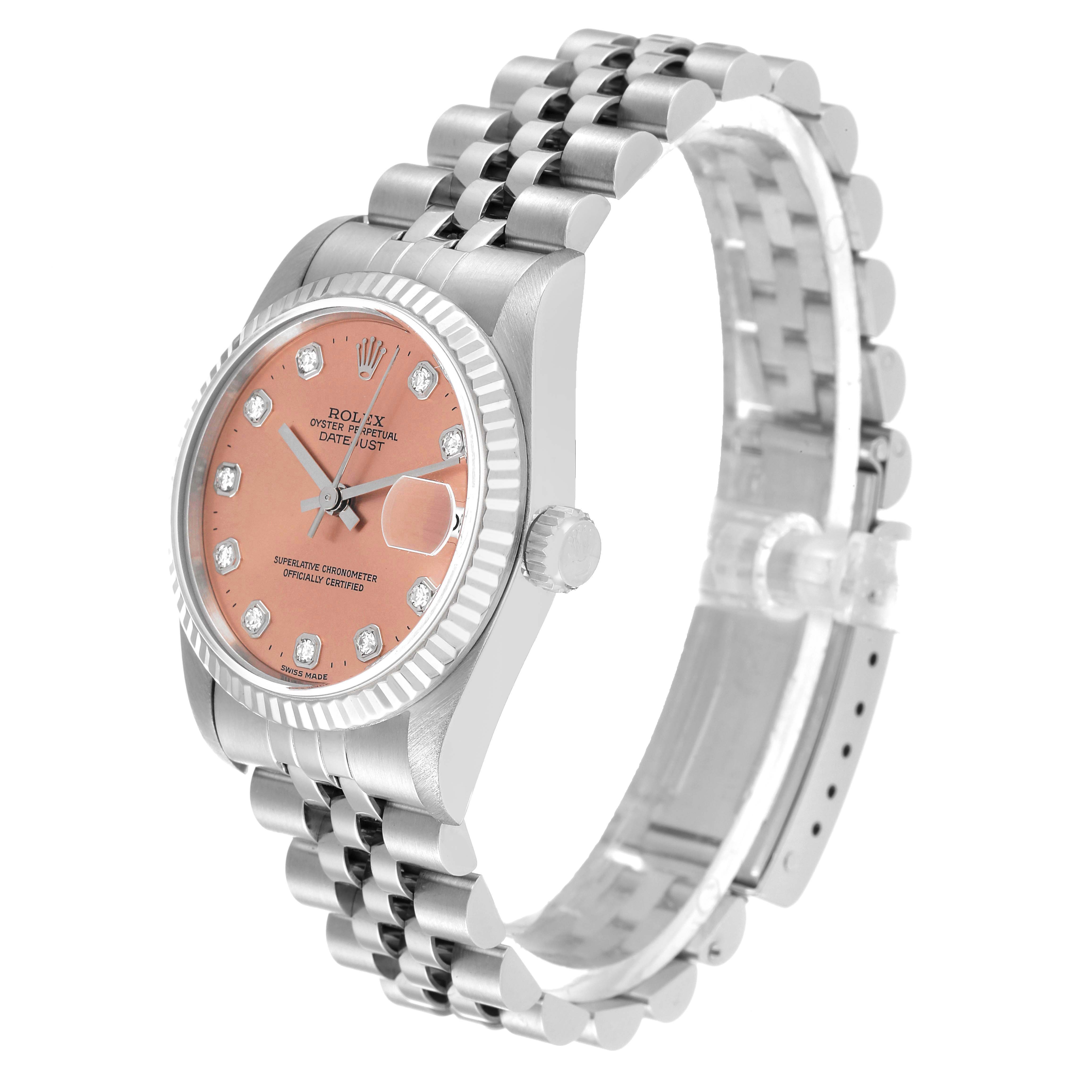 The image shows a side view of a Rolex Mid-Size 68274 Women
s Stainless Steel Pink Dial 68274 Women
s Stainless Steel Pink Dial Datejust watch, highlighting the full bracelet, crown, face, and bezel.