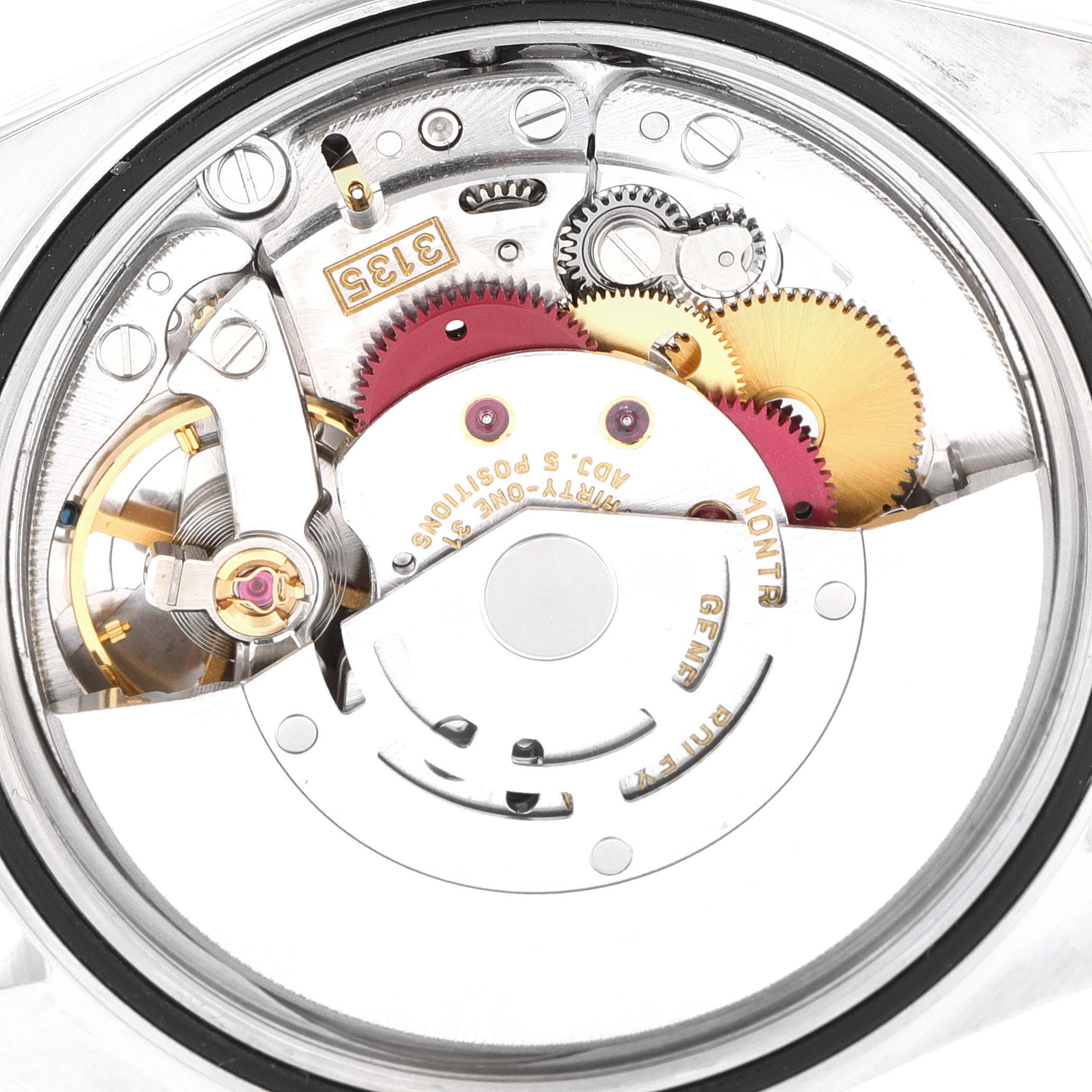 This image shows the internal movement mechanism of a Rolex Datejust 16233 Men
s Steel and Gold (two tone) Silver Dial 16233 Men
s Steel and Gold (two tone) Silver Dial watch from a close-up, top-down angle.