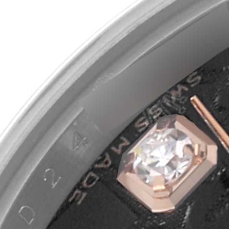 The image shows a close-up of the dial edge with a diamond marker on the Rolex Datejust 179161 Women's Steel and Gold (two tone) Black Dial 179161 Women's Steel and Gold (two tone) Black Dial.