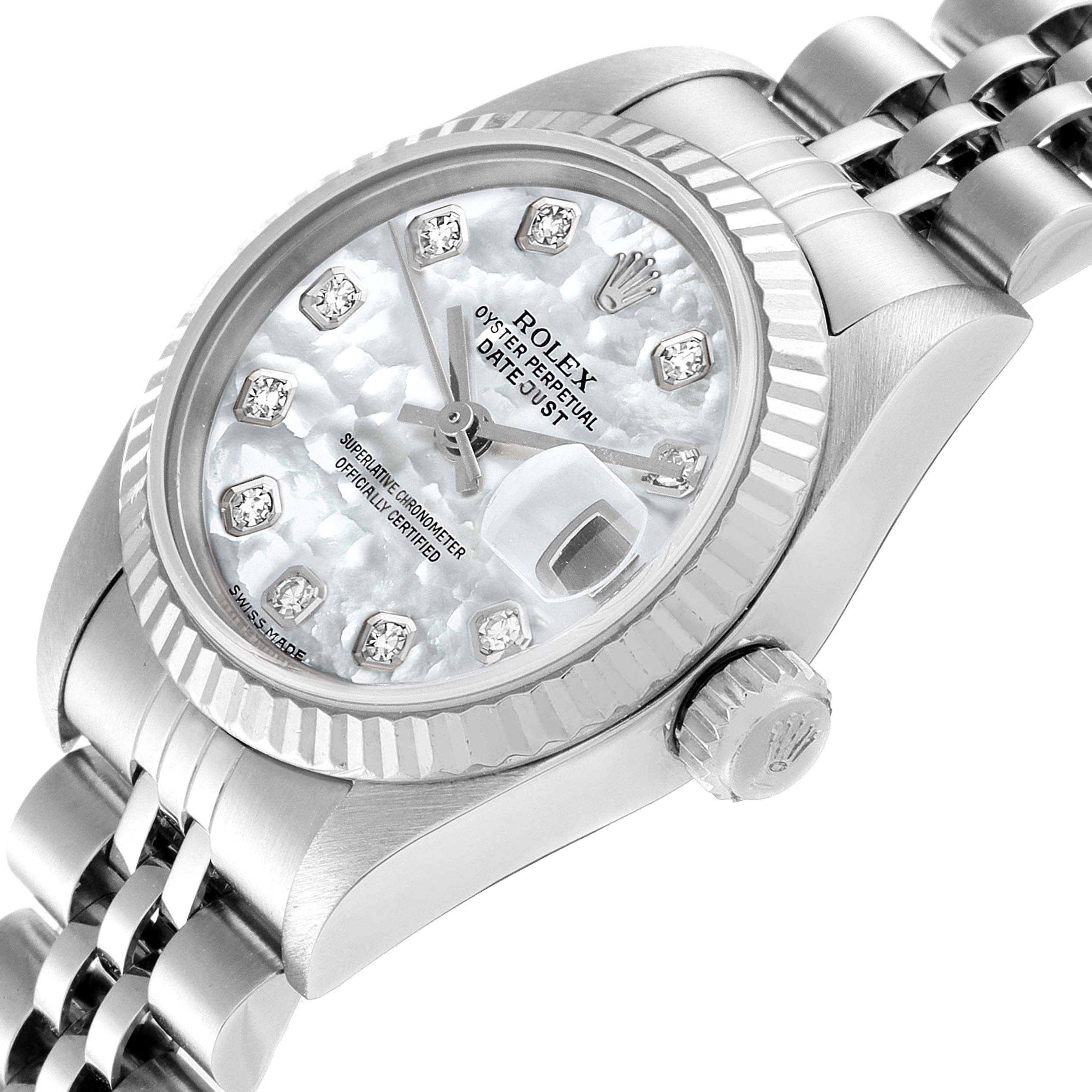 This image shows a close-up of a Rolex Datejust 79174 Women's Stainless Steel Mother of Pearl Dial 79174 Women's Stainless Steel Mother of Pearl Dial watch at an angle, displaying the face, crown, and part of the bracelet.