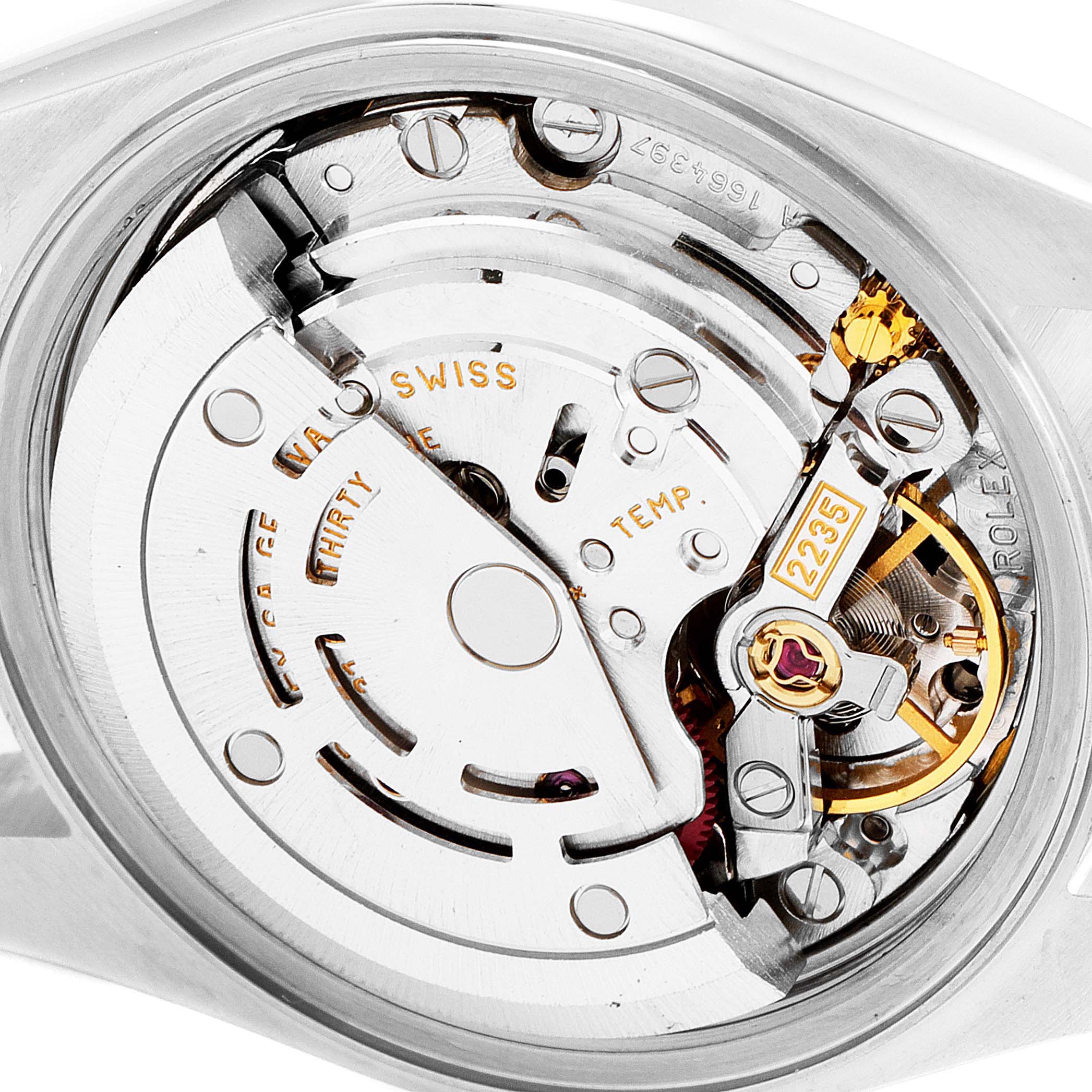 This is a close-up view of the movement of a Rolex Datejust 79174 Women's Stainless Steel Mother of Pearl Dial 79174 Women's Stainless Steel Mother of Pearl Dial watch, highlighting the intricate mechanical parts.