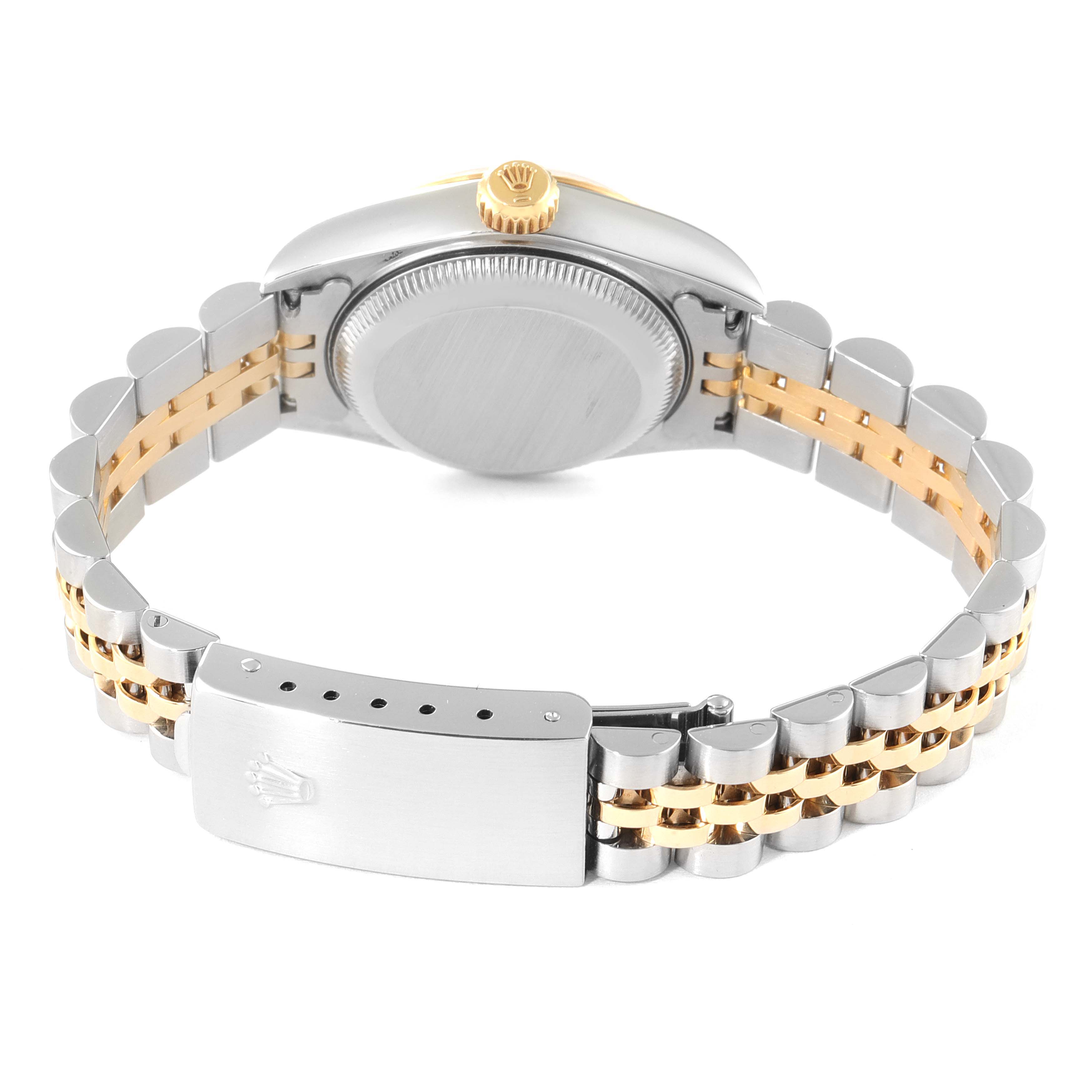 The image shows the back side of a Rolex Datejust 79173 Women's Steel and Gold (two tone) Black Dial 79173 Women's Steel and Gold (two tone) Black Dial watch, highlighting the clasp, case back, and bracelet.