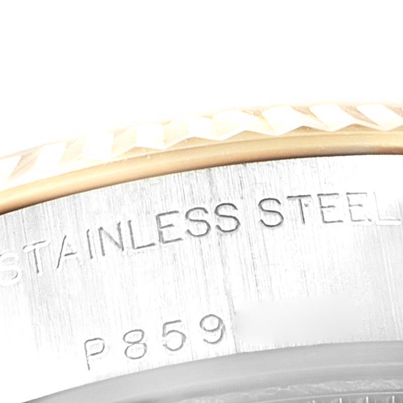 The image shows a close-up angle of the case side and bezel of a Rolex Datejust 79173 Women's Steel and Gold (two tone) Black Dial 79173 Women's Steel and Gold (two tone) Black Dial model, highlighting the "Stainless Steel" engraving.