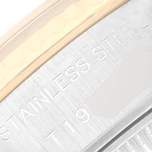 This close-up image shows the stainless steel part and a section of the bezel on a Rolex Datejust 69173 Women's Steel and Gold (two tone) Champagne Dial 69173 Women's Steel and Gold (two tone) Champagne Dial watch.