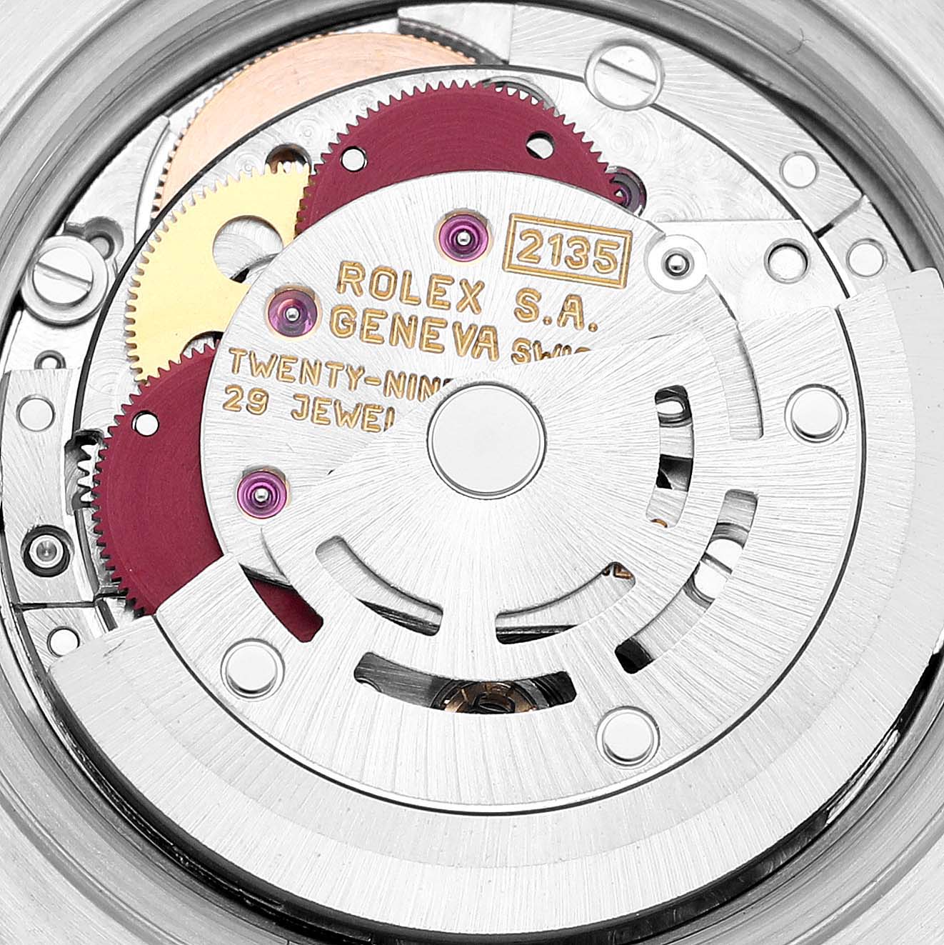 This image shows a close-up view of the internal movement of a Rolex Datejust 69173 Women's Steel and Gold (two tone) Champagne Dial 69173 Women's Steel and Gold (two tone) Champagne Dial model wristwatch, highlighting the intricate gears and components.