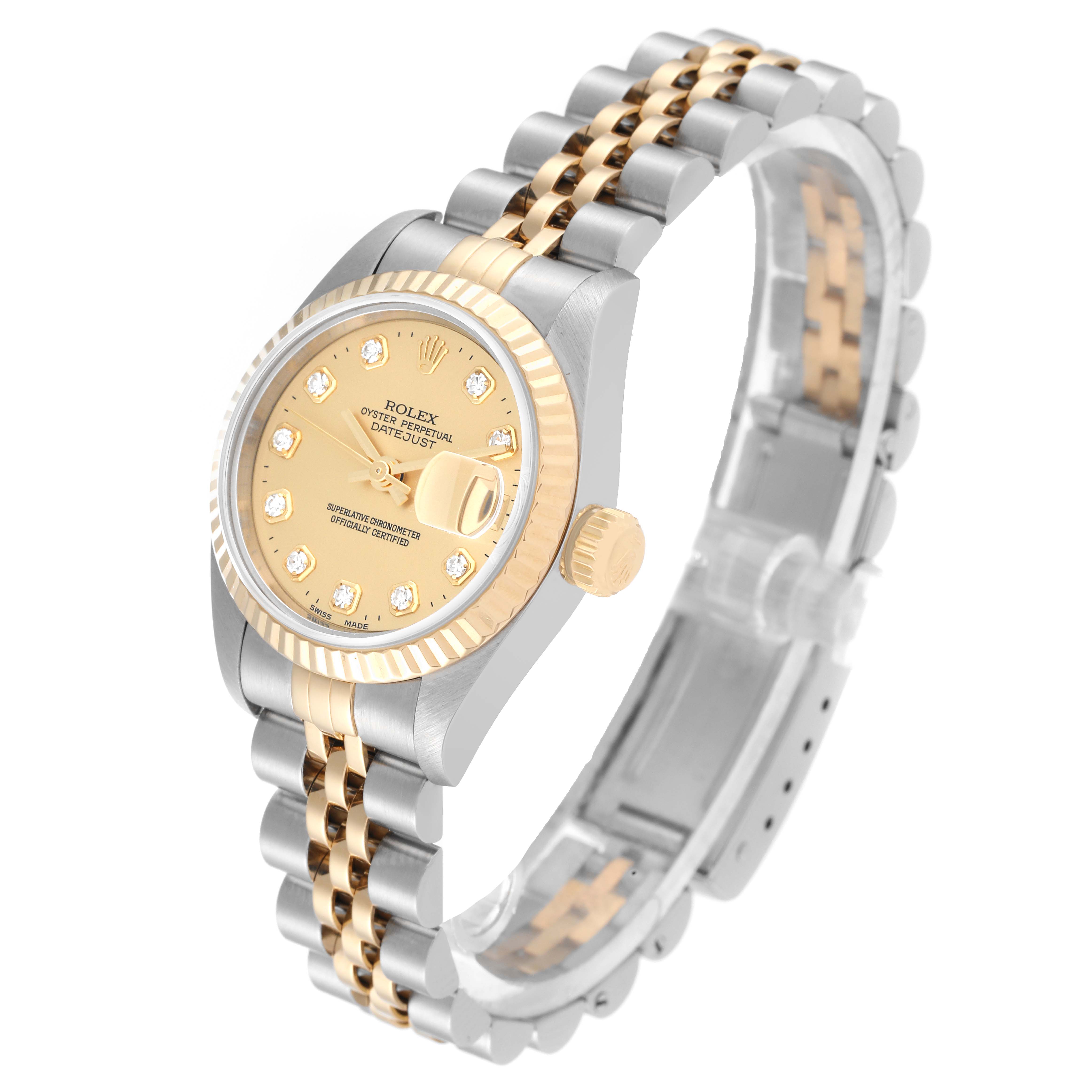 The image shows a Rolex Datejust 69173 Women's Steel and Gold (two tone) Champagne Dial 69173 Women's Steel and Gold (two tone) Champagne Dial watch at a tilted angle, highlighting its two-tone bracelet, bezel, and dial with diamond hour markers.