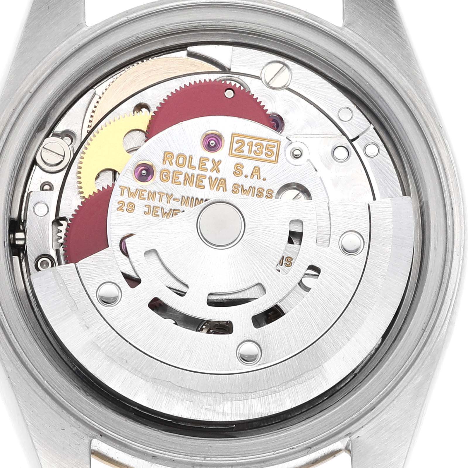 The image shows the back view of a Rolex Datejust 69173 Women's Steel and Gold (two tone) Champagne Dial 69173 Women's Steel and Gold (two tone) Champagne Dial, highlighting its internal movement and mechanisms.