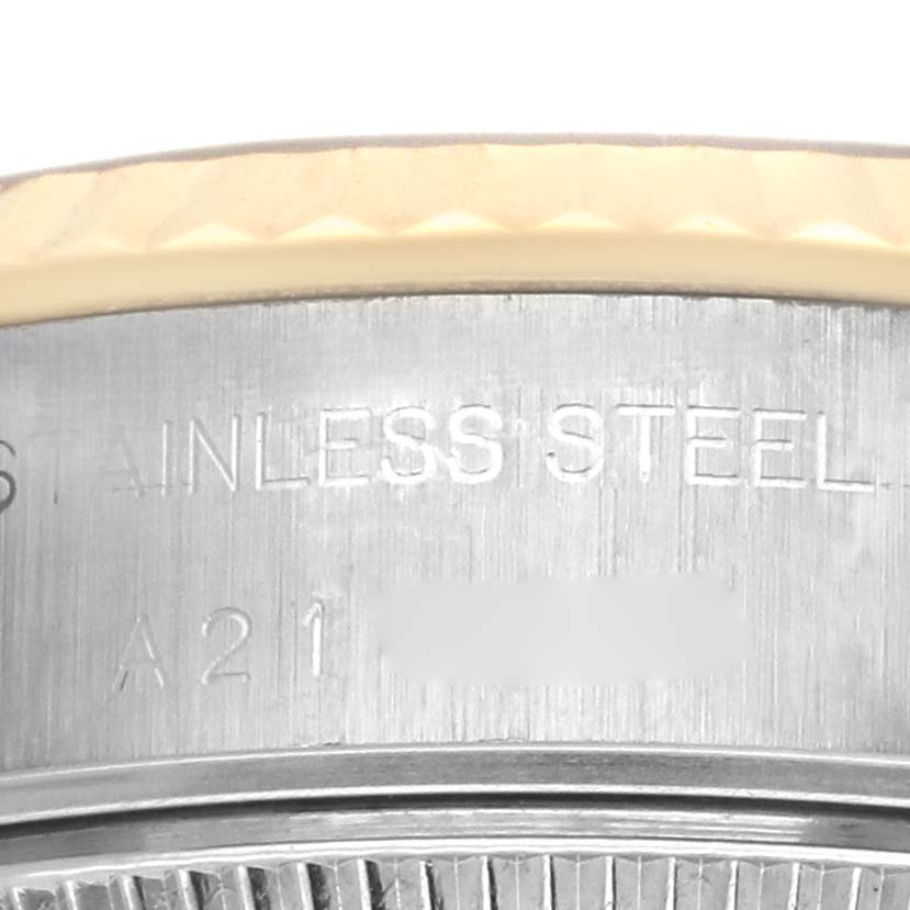 The image shows a close-up of the stainless steel case and bezel of the Rolex Datejust 79173 Women's Steel and Gold (two tone) Champagne Dial 79173 Women's Steel and Gold (two tone) Champagne Dial watch.