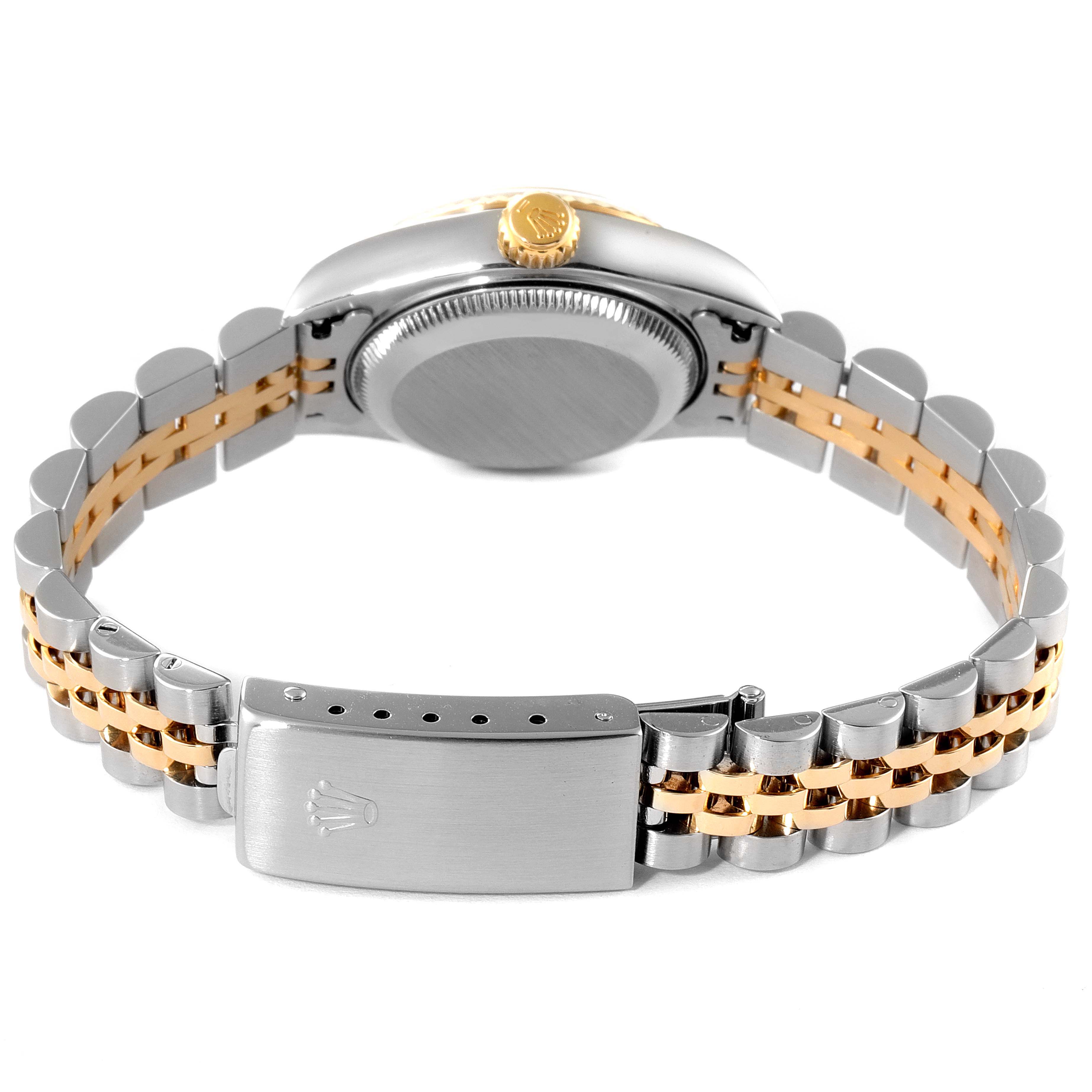 The image shows the back and strap of a Rolex Datejust 79173 Women's Steel and Gold (two tone) Black Dial 79173 Women's Steel and Gold (two tone) Black Dial watch, highlighting its two-tone bracelet and clasp.