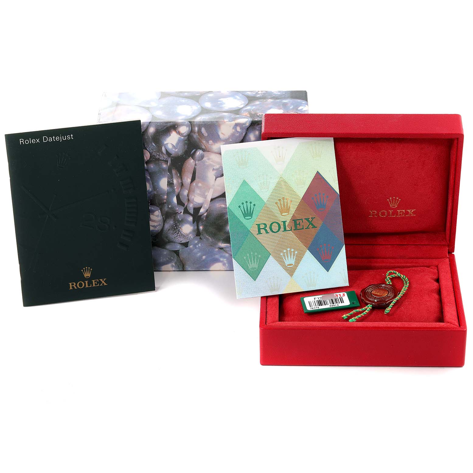 The image shows various accessories for the Rolex Datejust 79173 Women's Steel and Gold (two tone) Black Dial 79173 Women's Steel and Gold (two tone) Black Dial, including the booklet, warranty card, tags, and a red presentation box.