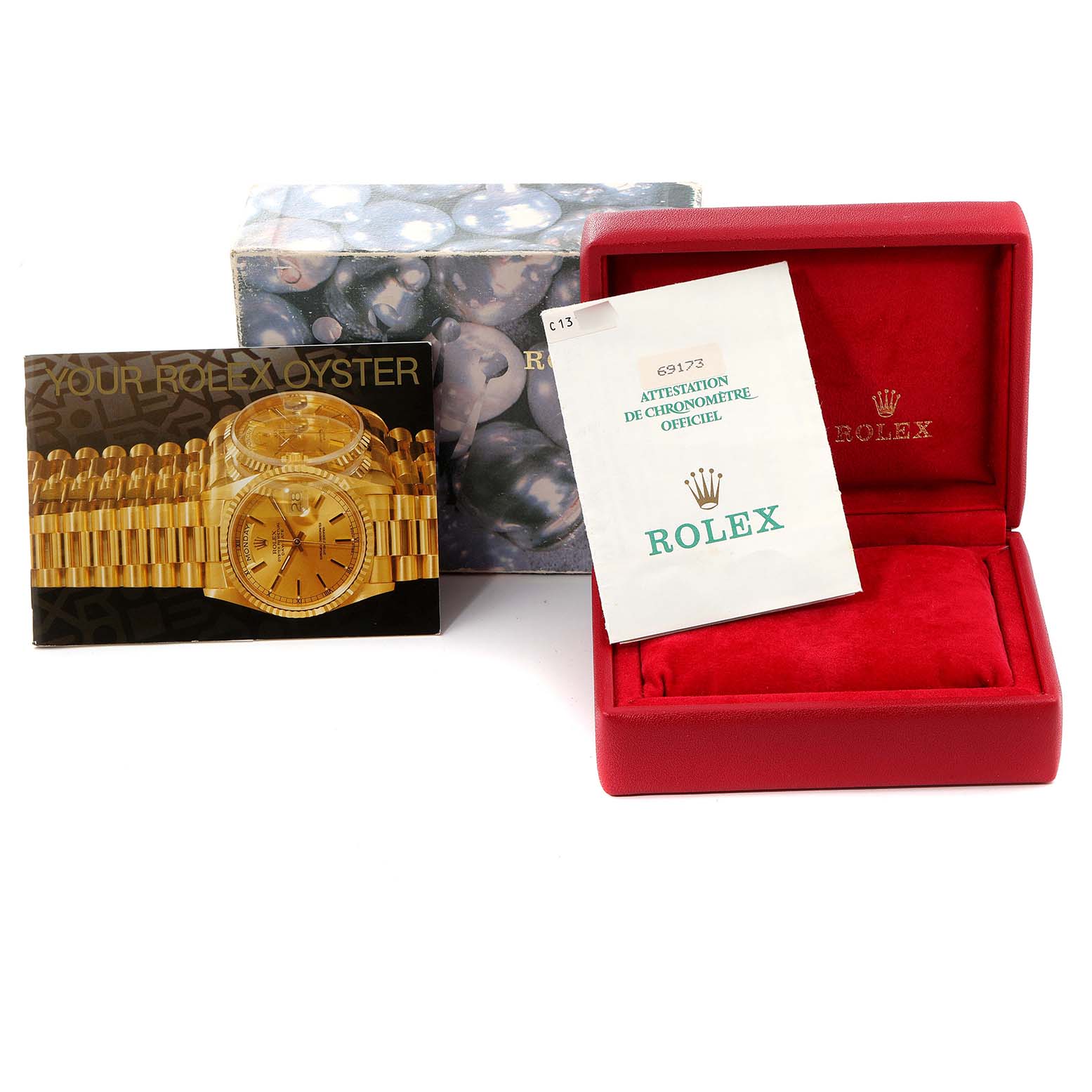The image shows Rolex Datejust 69173 Women
s Steel and Gold (two tone) Champagne Dial 69173 Women
s Steel and Gold (two tone) Champagne Dial accessories, including a red box, certification, outer box, and a brochure featuring the watch.