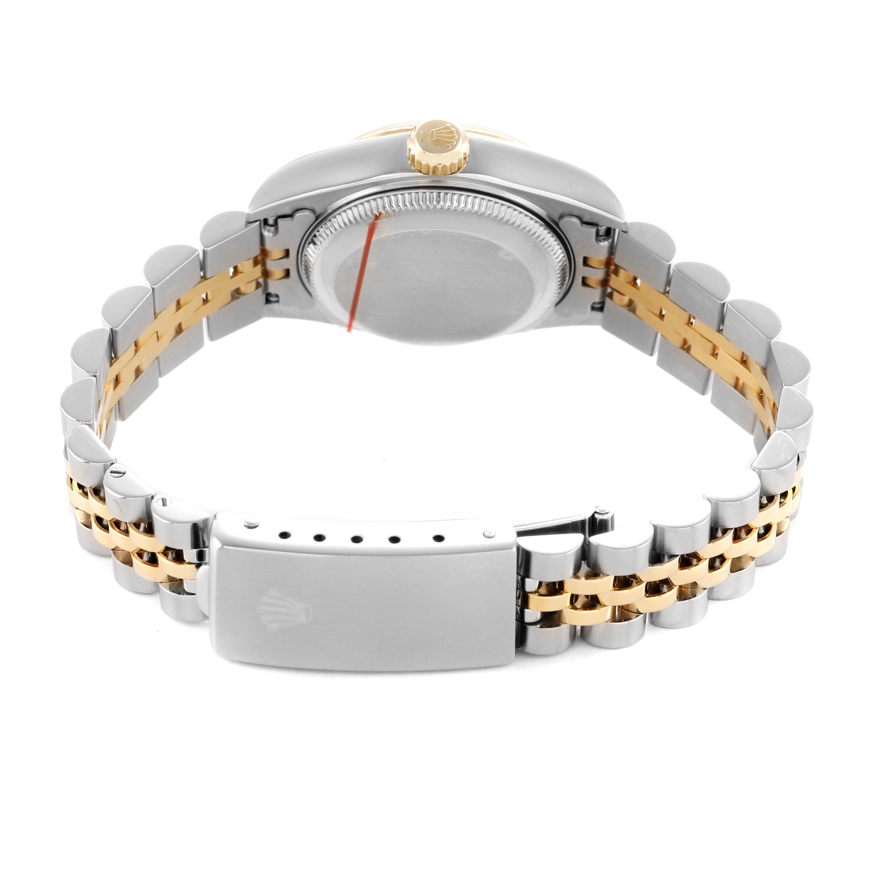 The Rolex Datejust 79173 Women's Steel and Gold (two tone) Champagne Dial is shown from the back, highlighting the case back, crown, and two-tone bracelet with clasp.