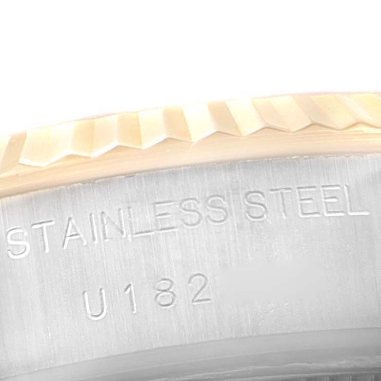 This image shows a close-up of the stainless steel casing and part of the fluted bezel of a Rolex Datejust 69173 Women
s Steel and Gold (two tone) White Dial 69173 Women
s Steel and Gold (two tone) White Dial watch.