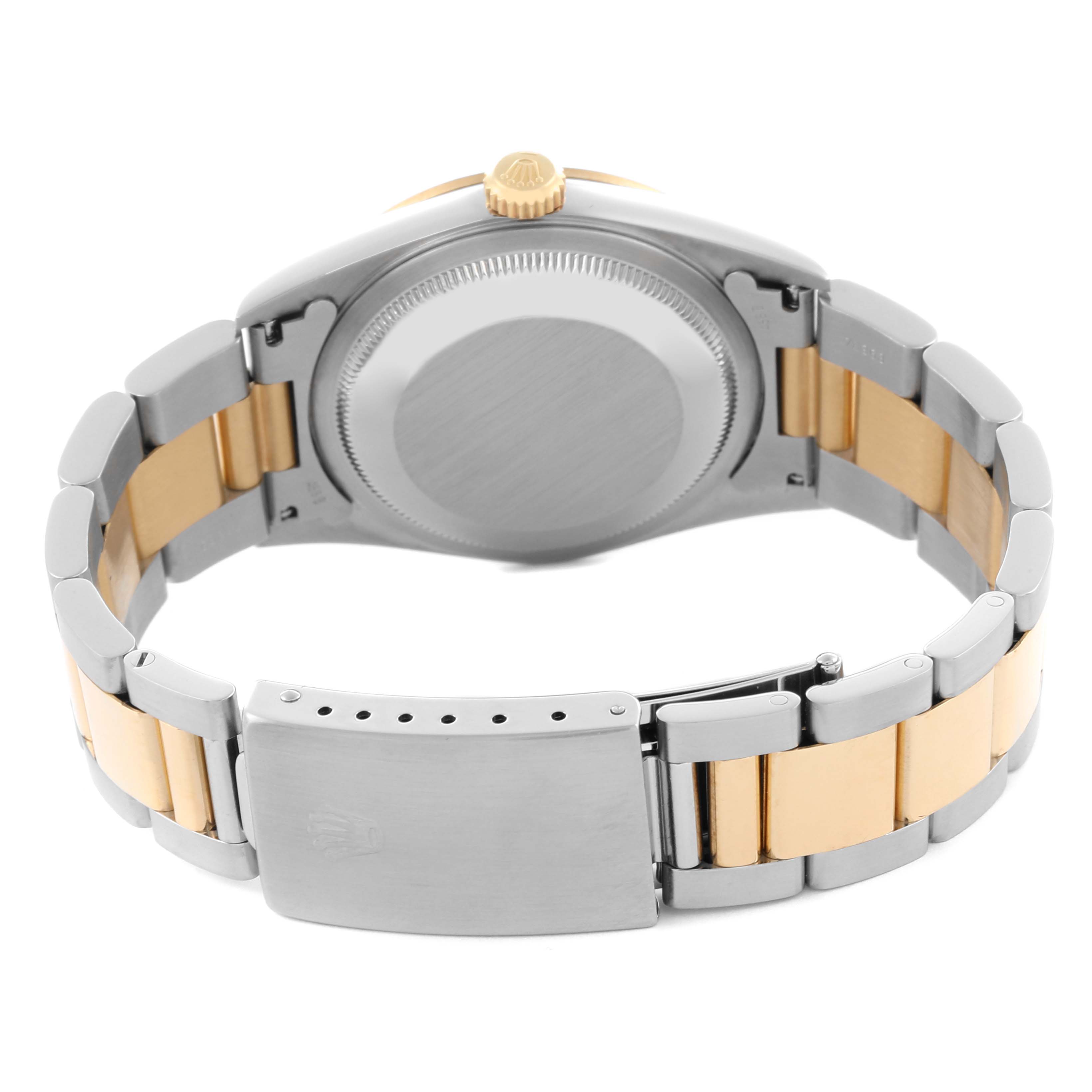The image shows the back and clasp of a Rolex Datejust 16203 Men's Steel and Gold (two tone) Grey Dial 16203 Men's Steel and Gold (two tone) Grey Dial, highlighting the case and two-tone bracelet.
