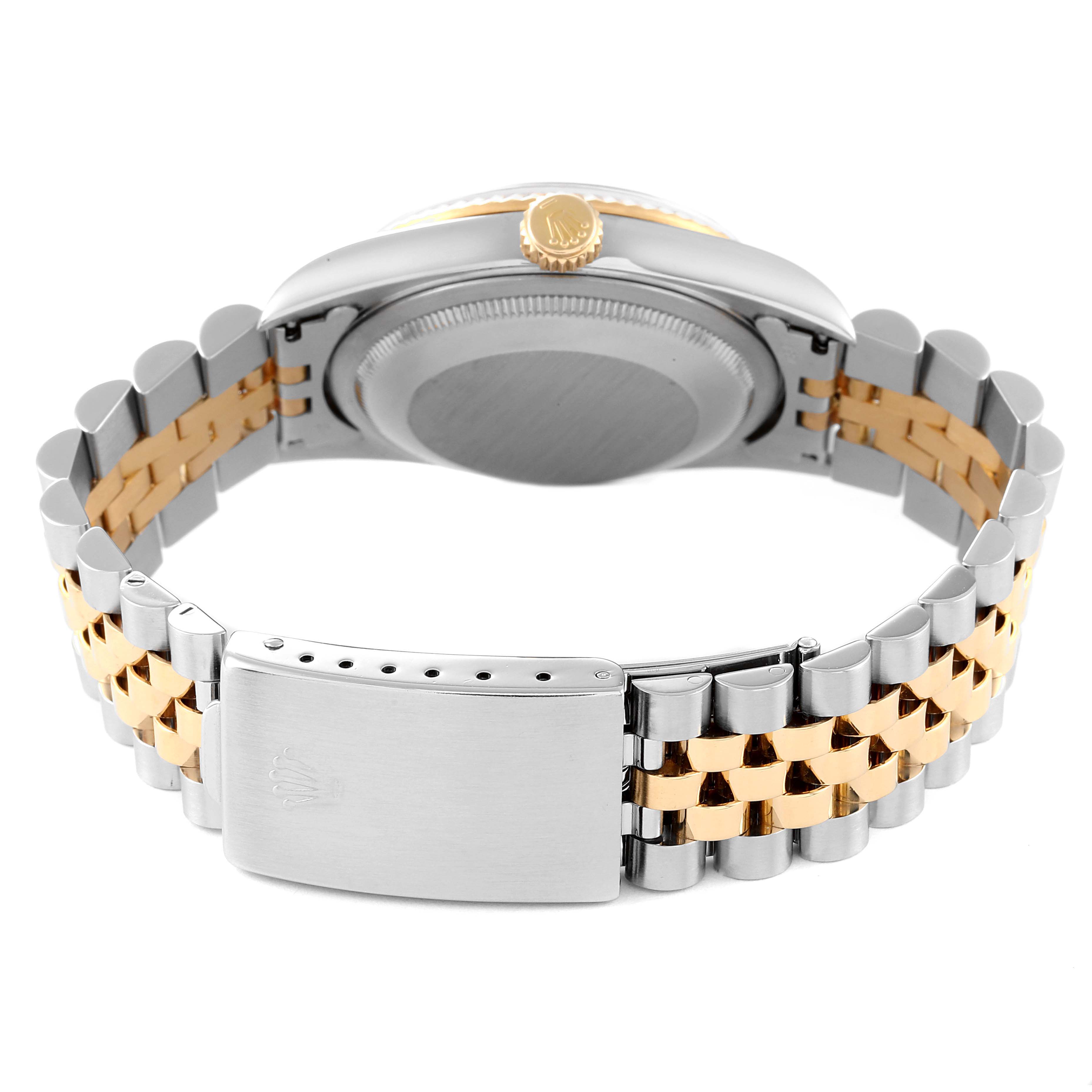 The image shows the back, clasp, and bracelet of a Rolex Datejust 16233 Men's Steel and Gold (two tone) White Dial 16233 Men's Steel and Gold (two tone) White Dial watch, highlighting its two-tone metal design.