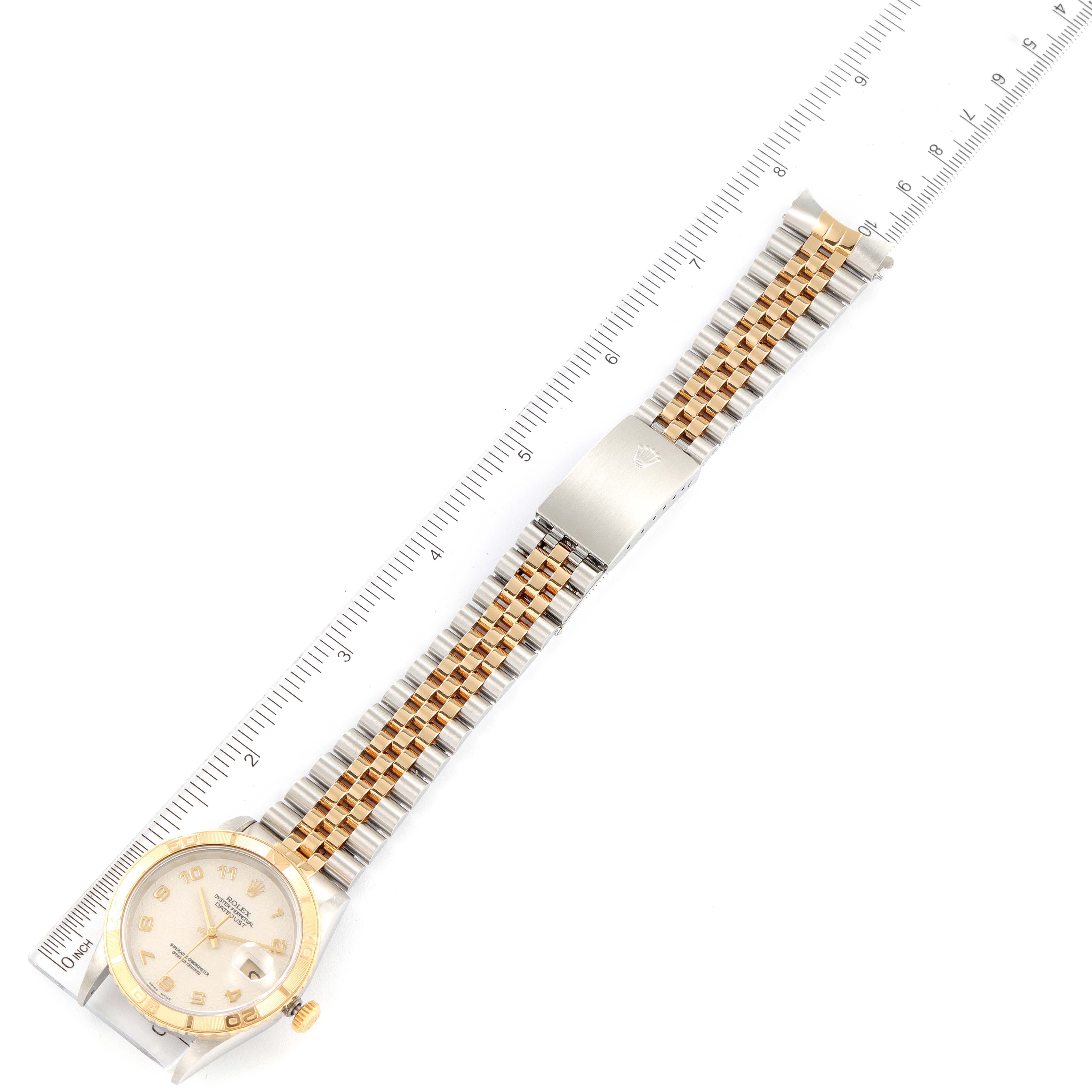 The image shows a top view of a Rolex Turn-o-Graph 16263 Men
s Steel and Gold (two tone) Beige Dial 16263 Men
s Steel and Gold (two tone) Beige Dial watch, displaying the face, bracelet, and clasp.